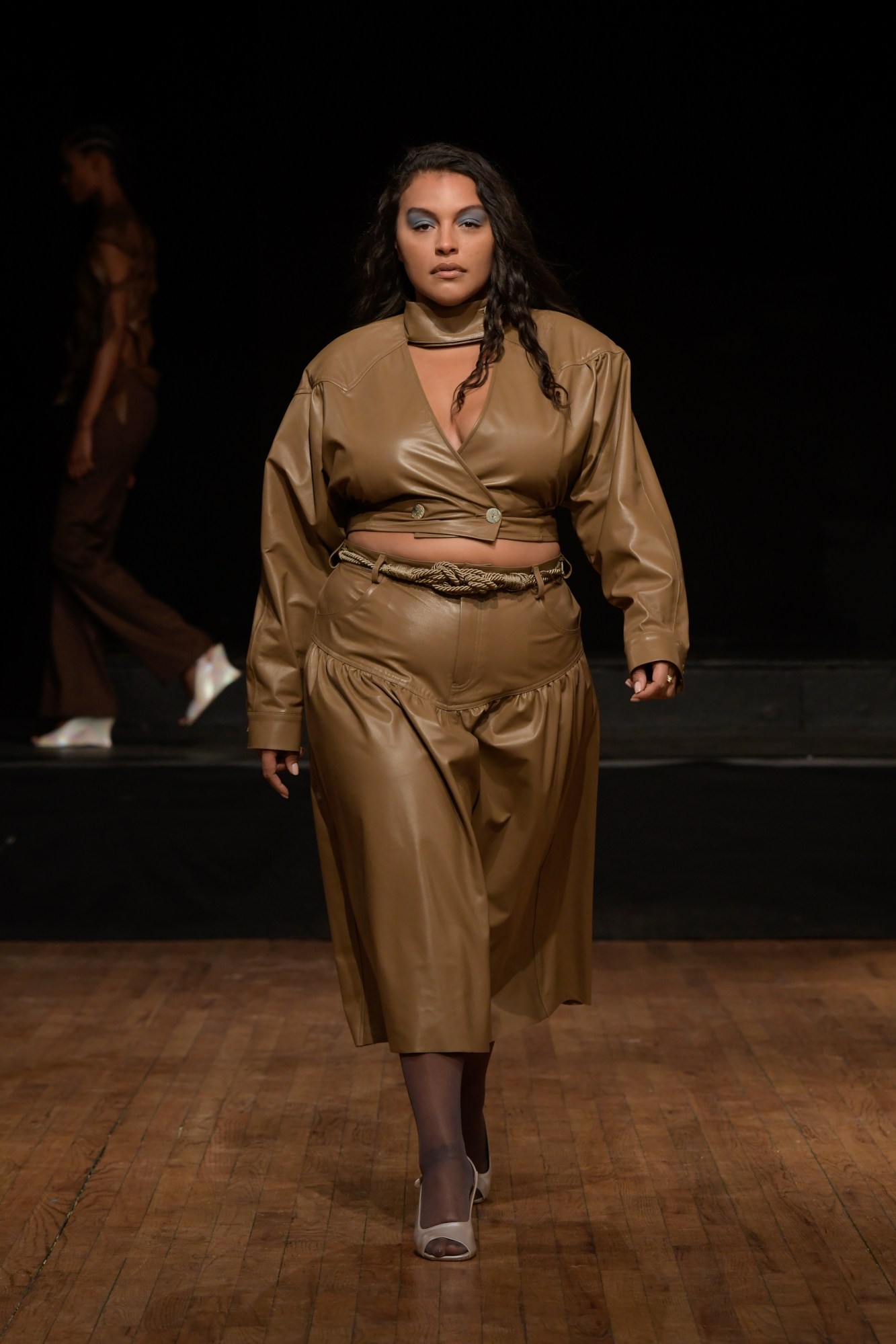 a model walking the runway at maryam nassir zadeh's aw22 show at new york fashion week