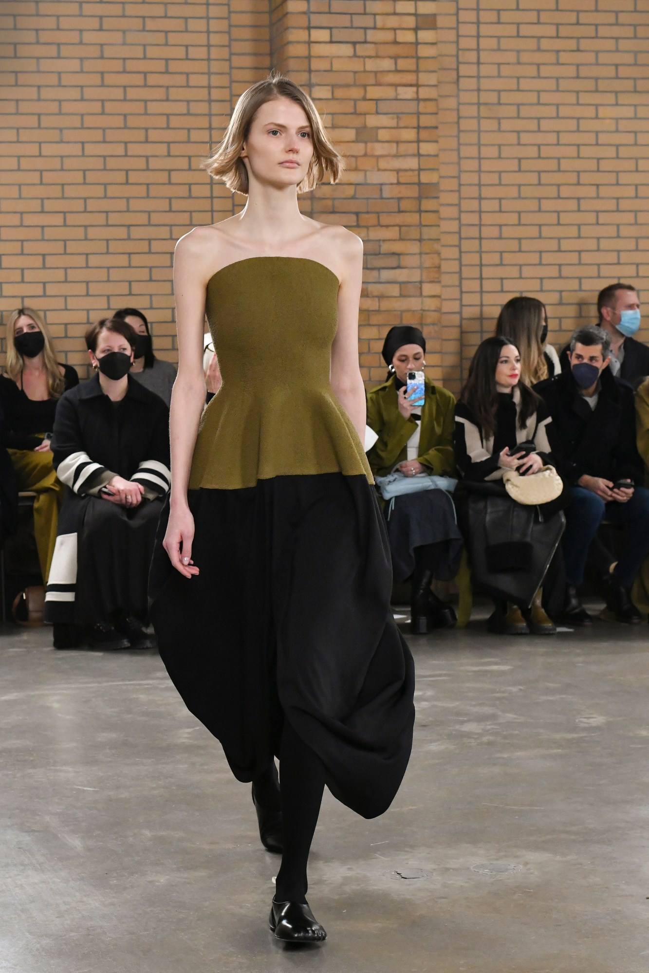 a model walking the runway at proenza schouler's aw22 show at new york fashion week