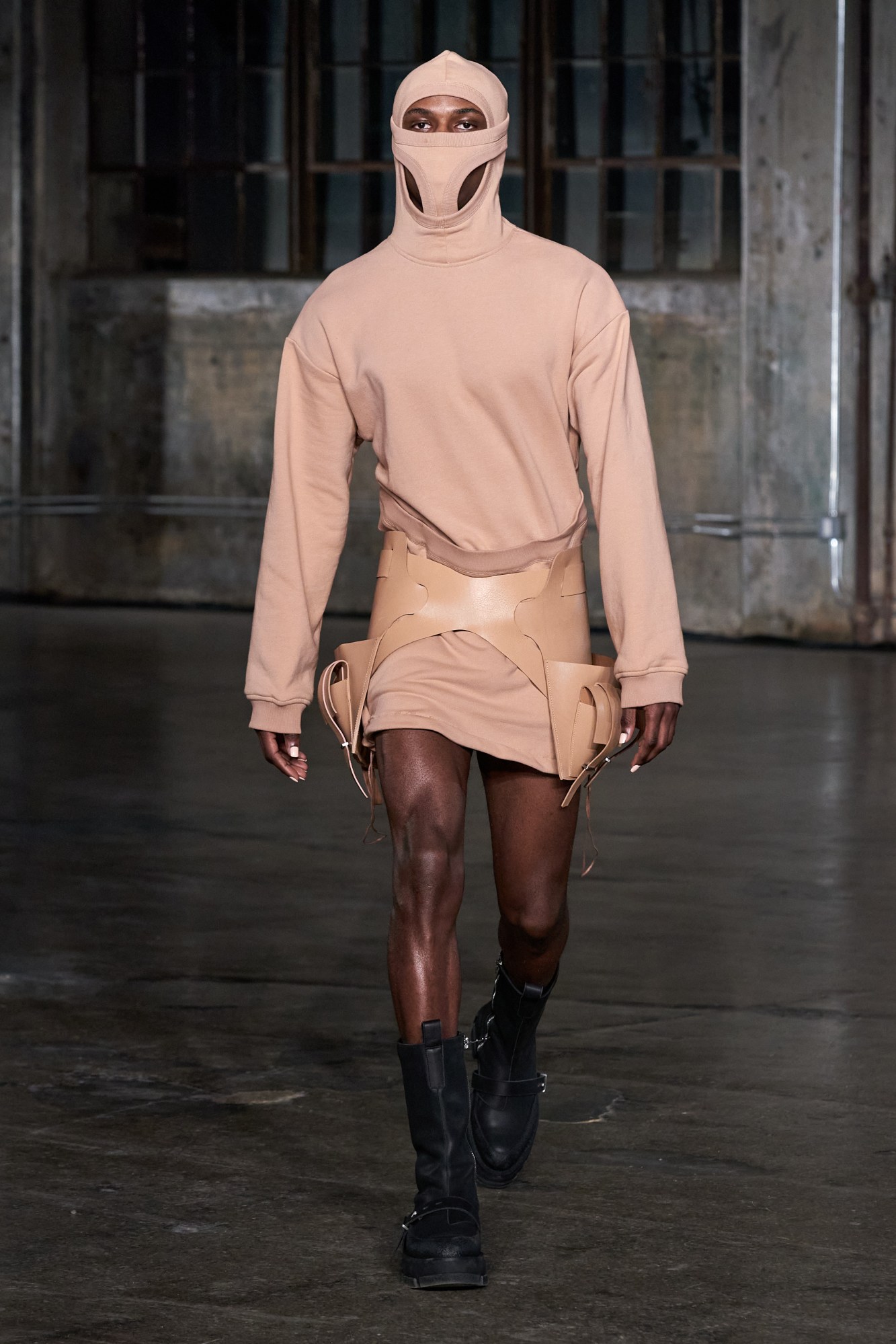 a model walking the runway at dion lee's aw22 show at new york fashion week