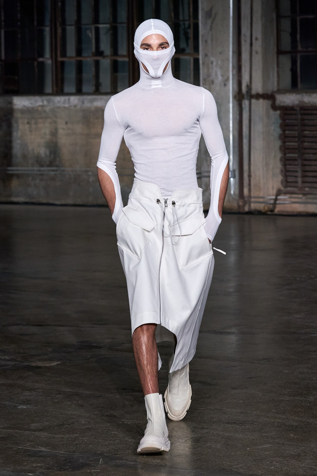 a model walking the runway at dion lee's aw22 show at new york fashion week