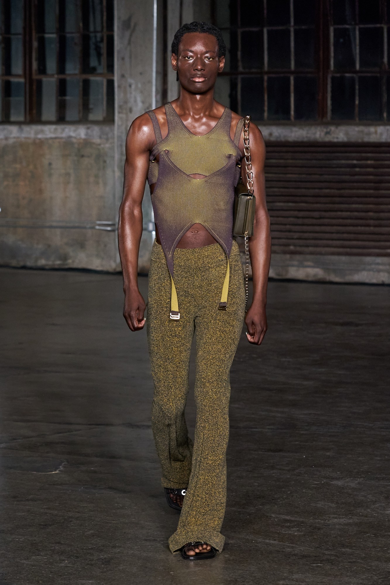 a model walking the runway at dion lee's aw22 show at new york fashion week