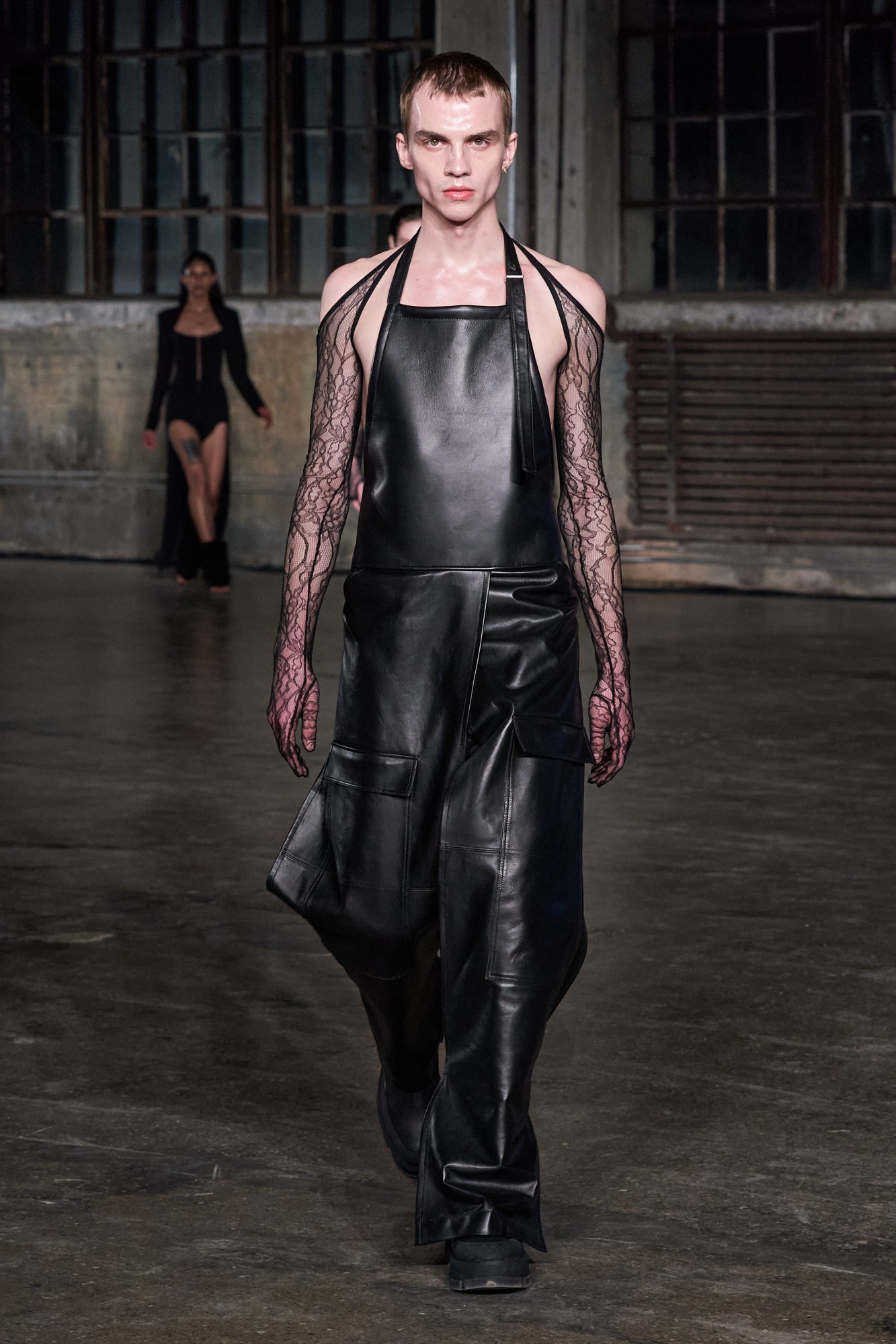 a model walking the runway at dion lee's aw22 show at new york fashion week