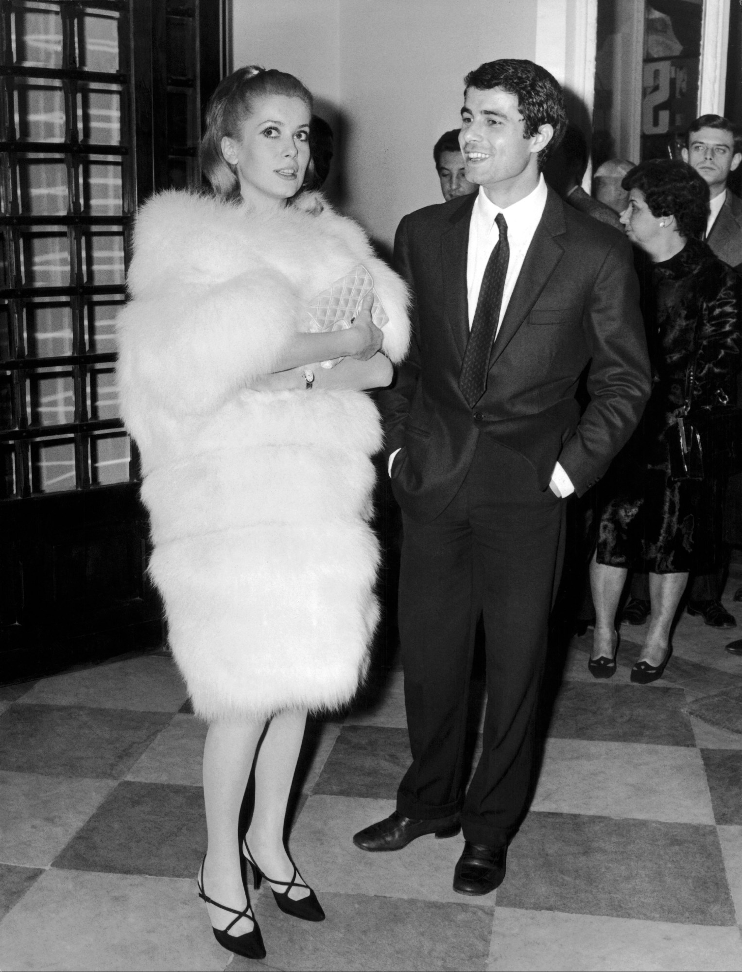 catherine deneuve in a fur coat with david bailey