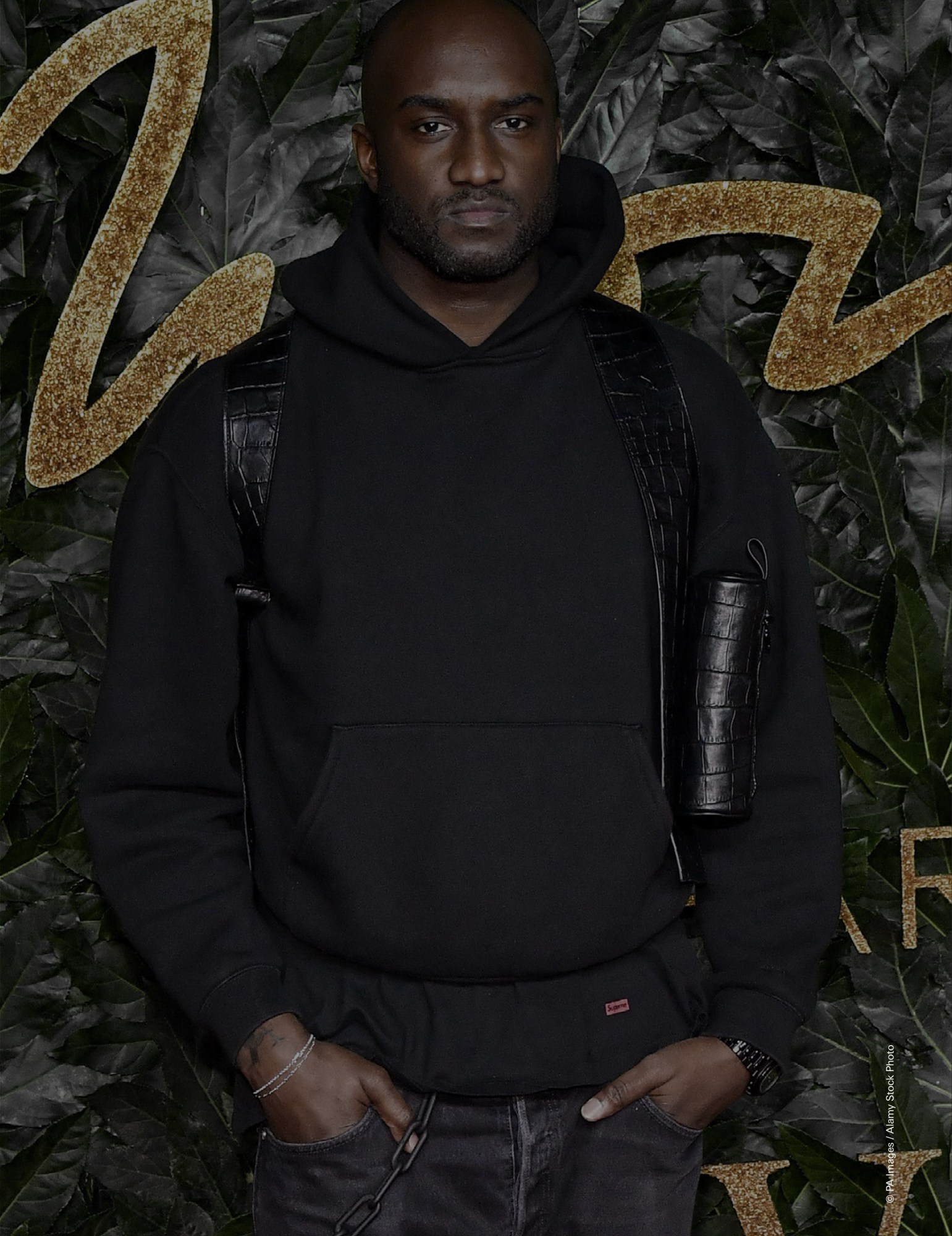 the late designer virgil abloh wearing a black hoodie