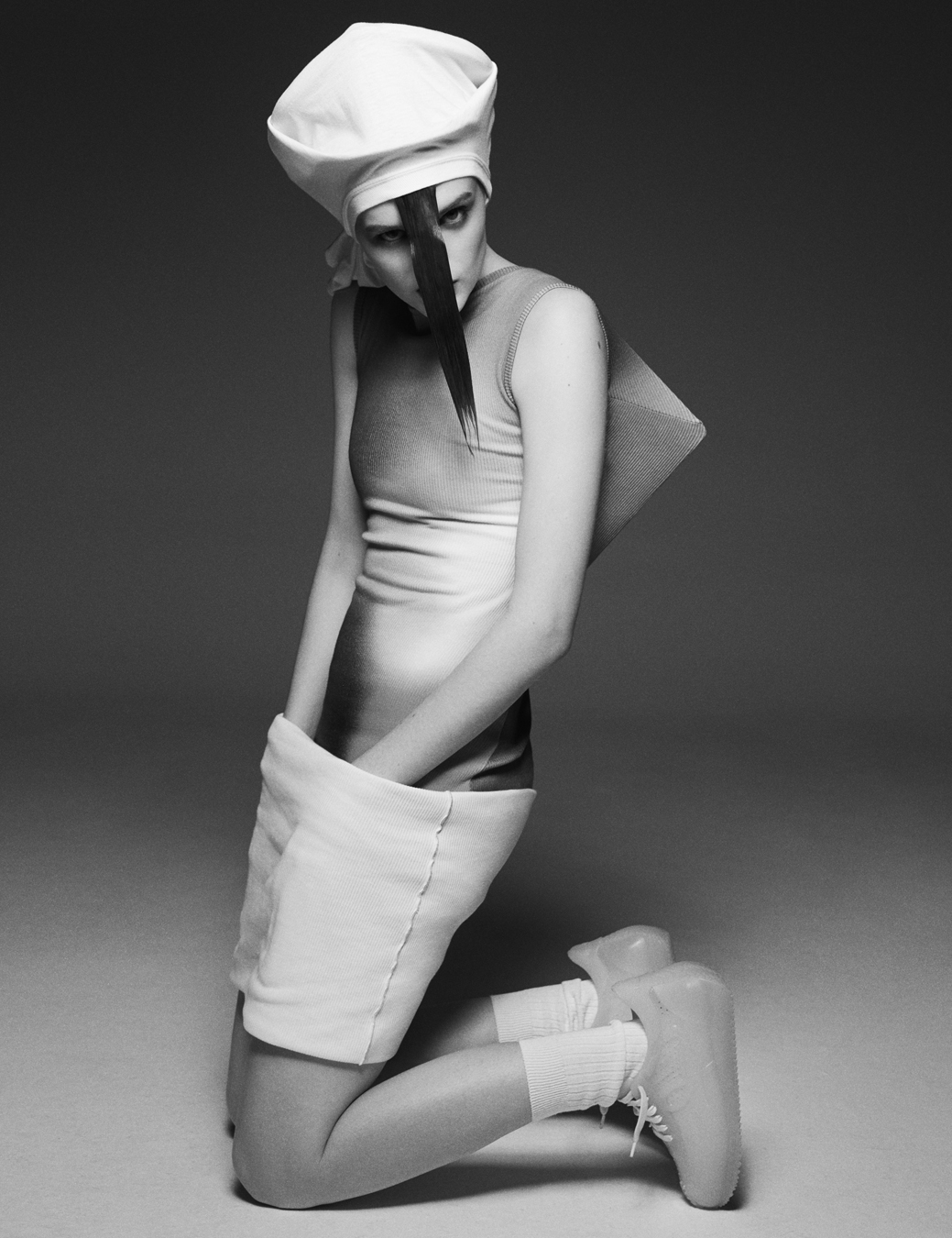 Model wears Loewe SS22 in i-D 367 The Out Of Body Issue