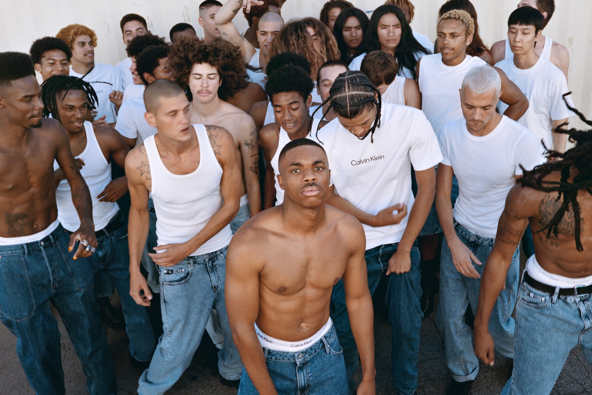 Group of models wearing Calvin Klein and dancing