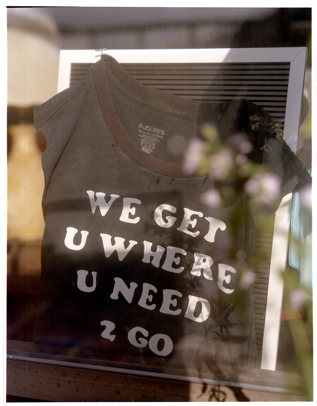 a portrait of a tshirt that says we get u where u need 2 go