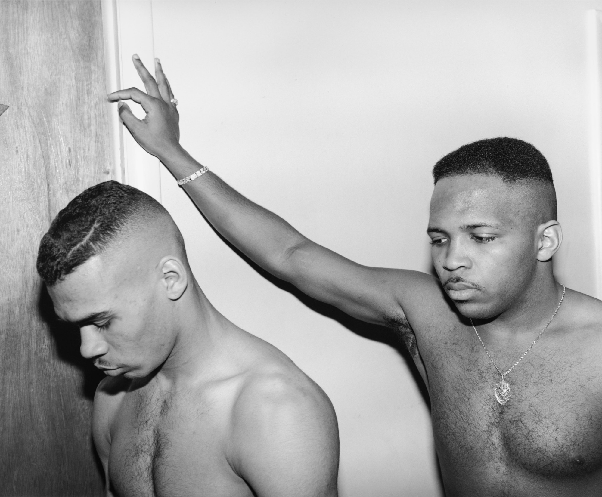 two young boxers with their shirts off by ken graves and eva lipman