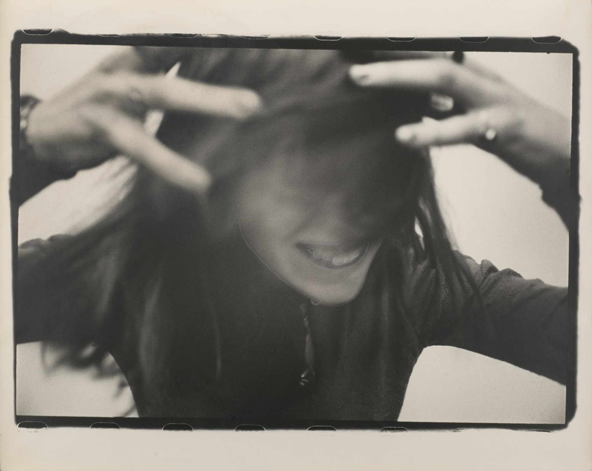 Photograph of a model dancing by Marcia Resnick