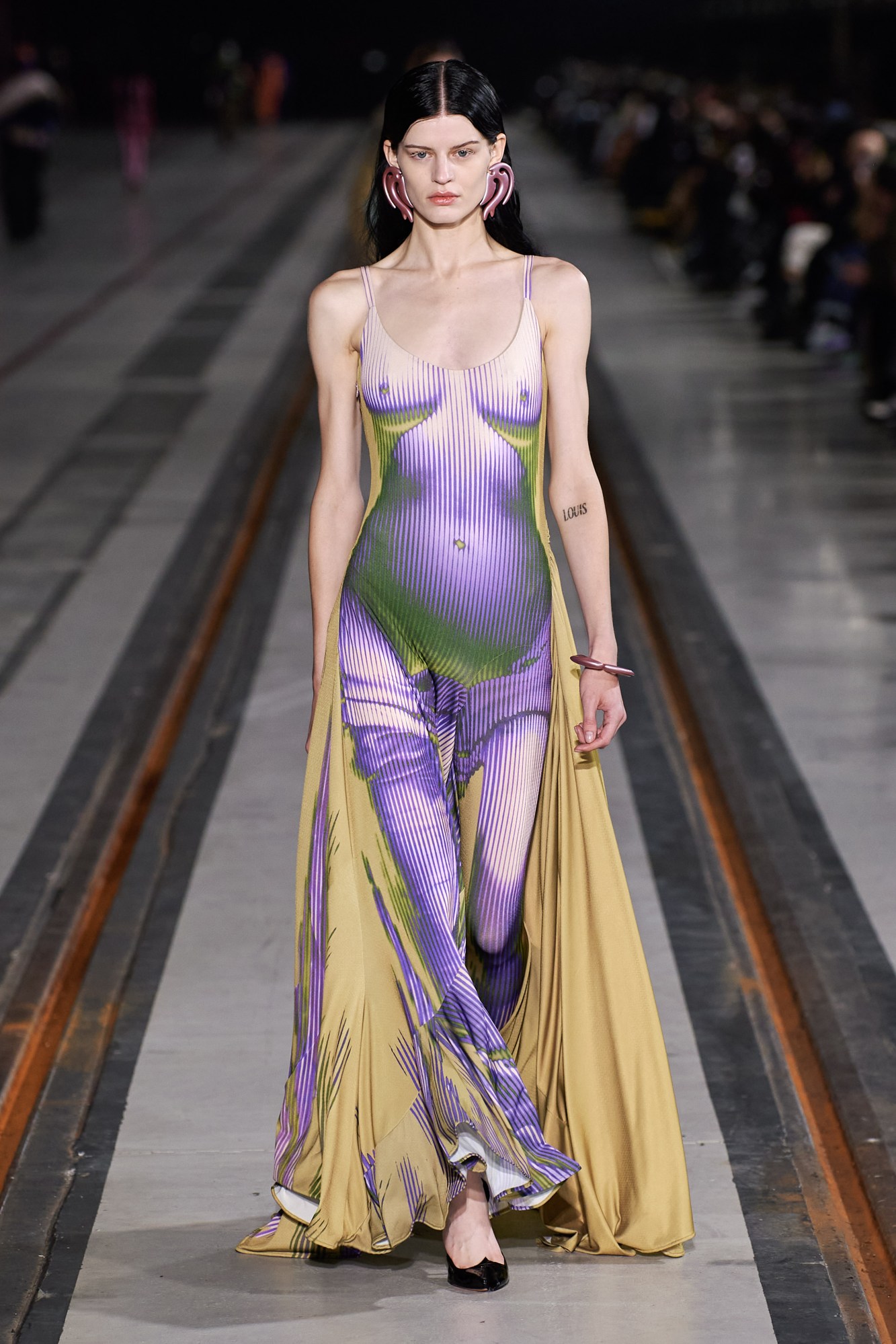 a model wearing a naked dress on the runway at y/project aw22