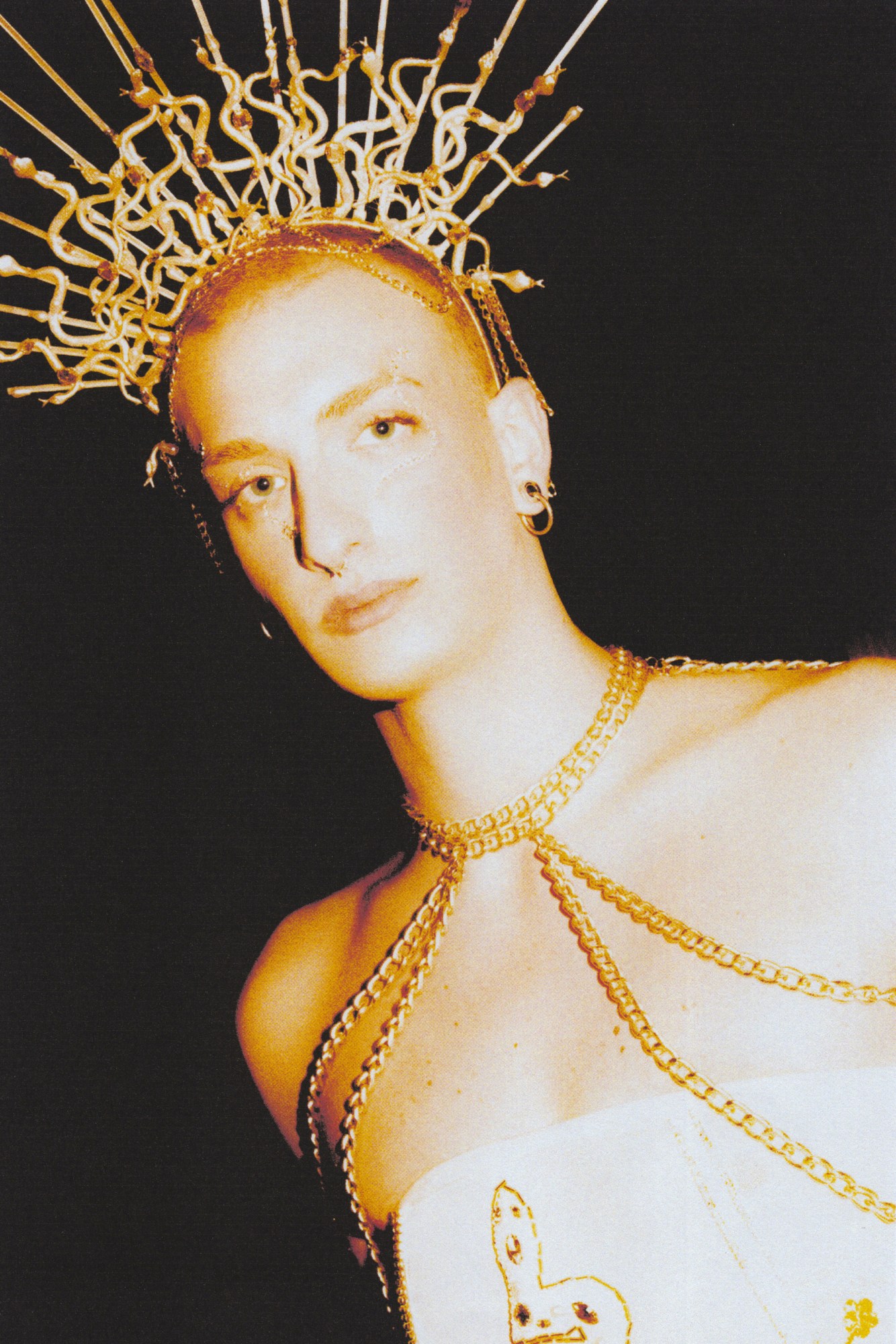 Napoli ballroom scene portrait of somebody wearing a medusa crown and chains