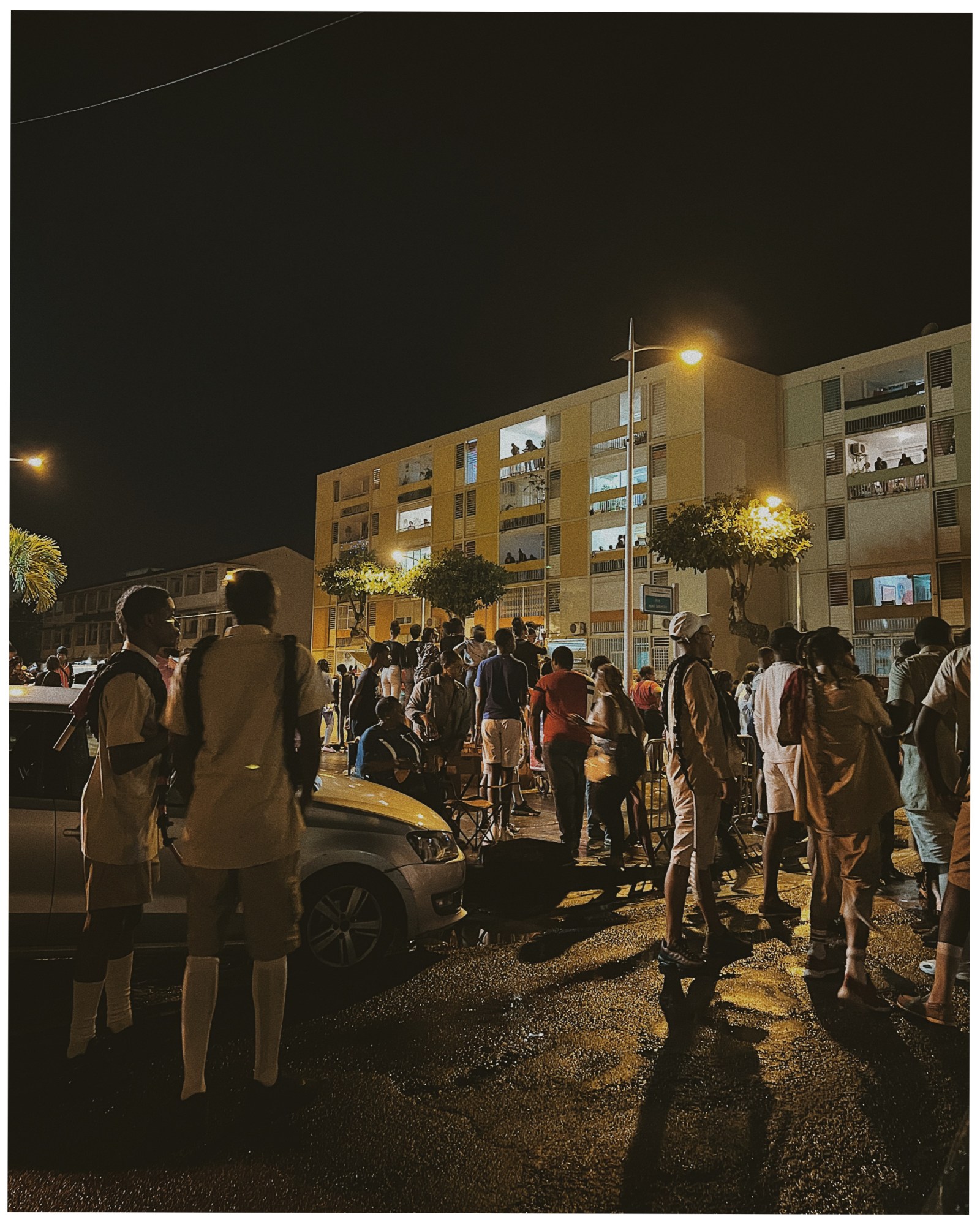 People gathered outside a building.