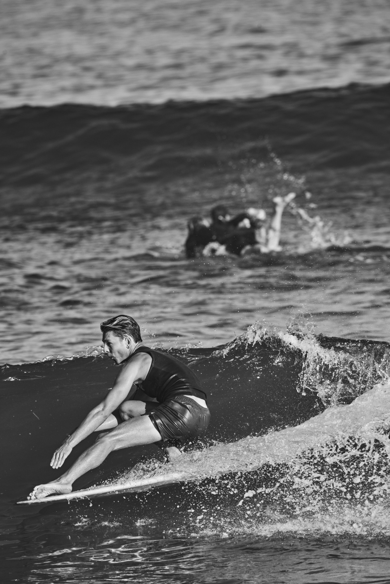 Surfers in the water.