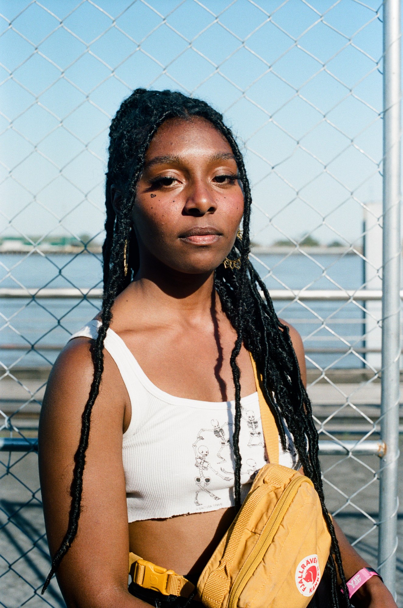 trinity posing at buku music + arts festival in new orleans