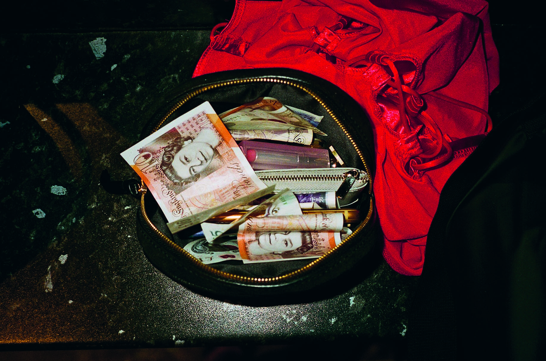 a handbag full of cash