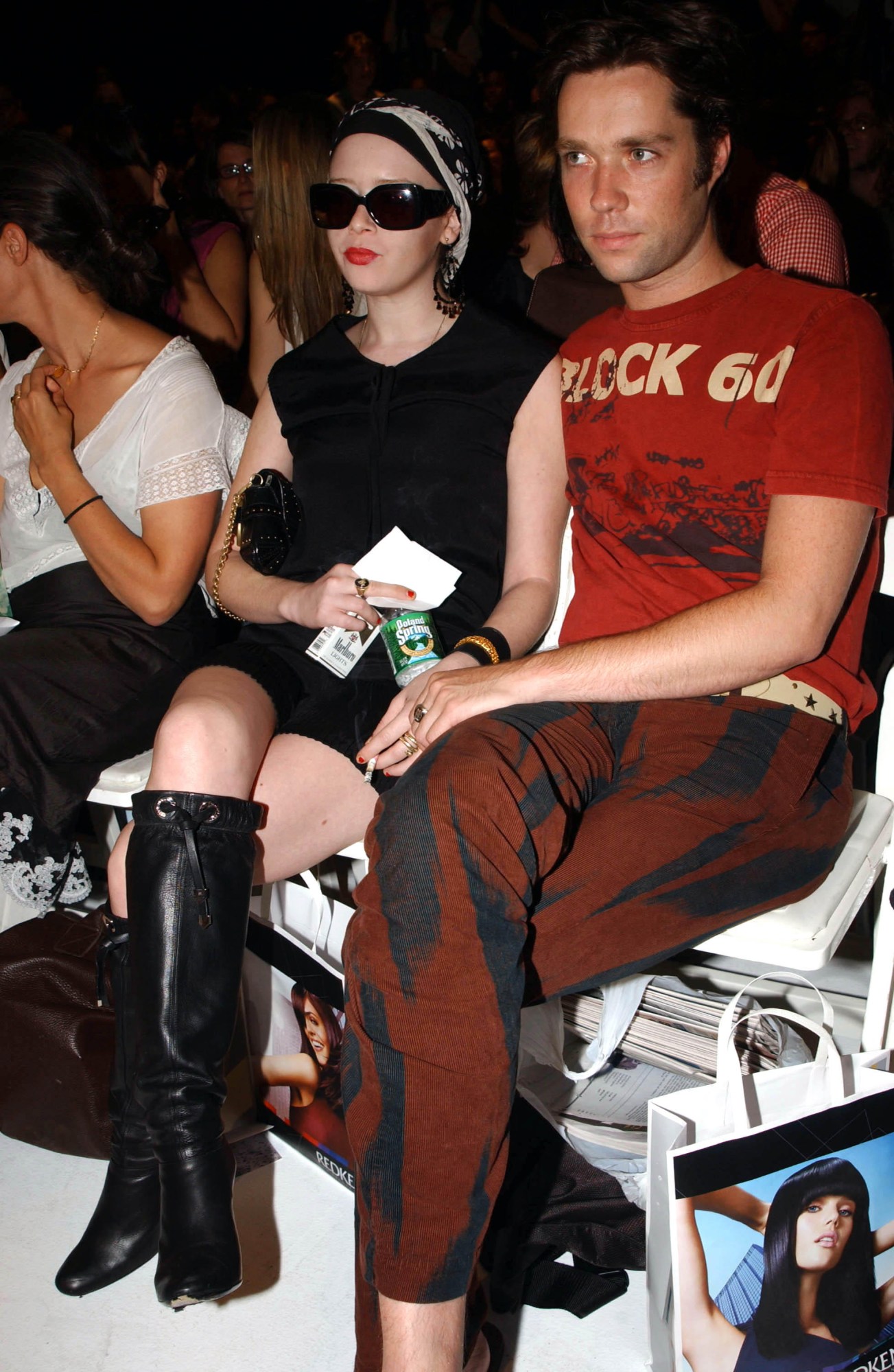 natasha lyonne and rufus wainwright sit front row at NYFW ignoring the camera