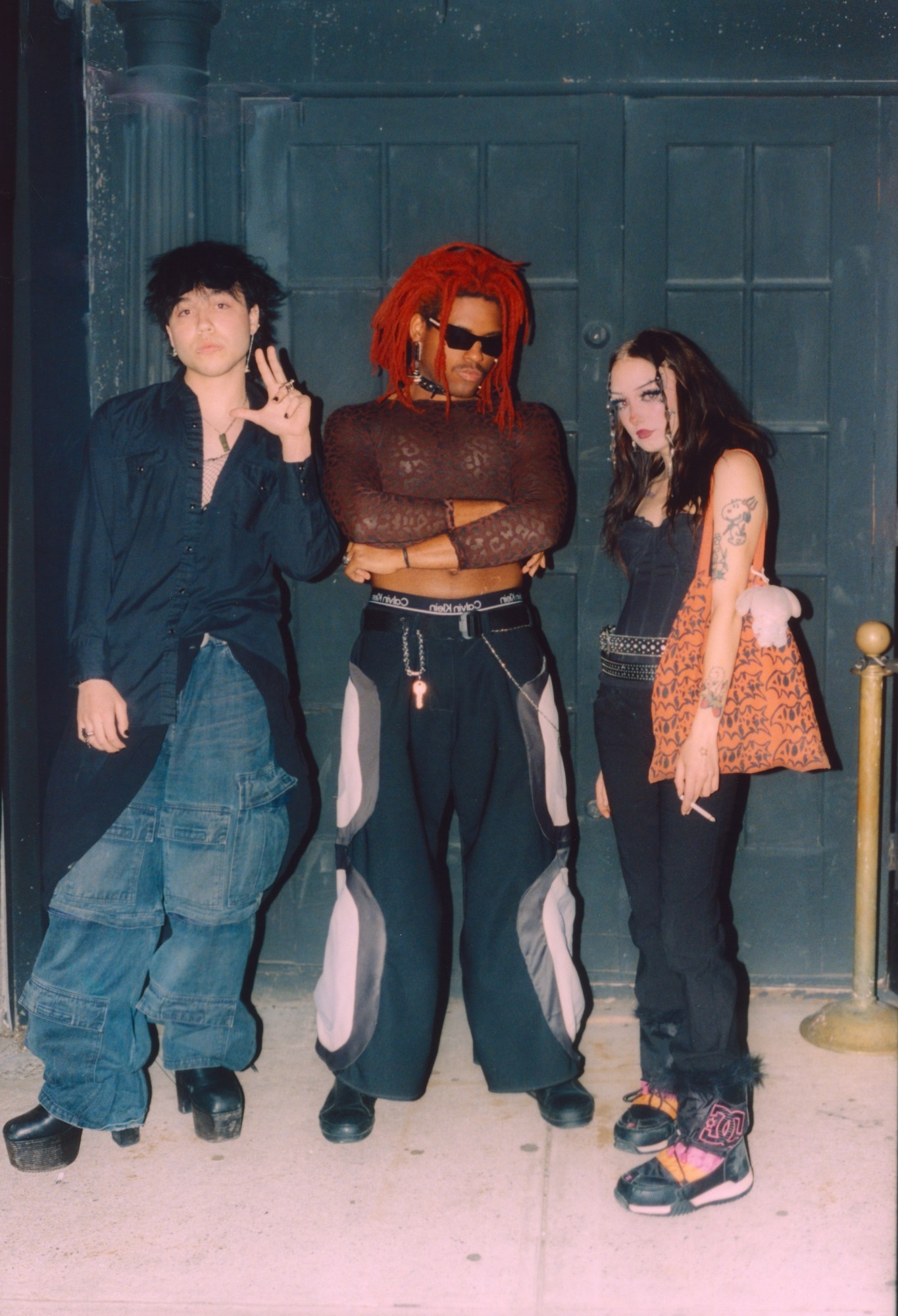 portrait of three people at the i-d x heaven marc jacobs party photographed by karl-hens pompilus