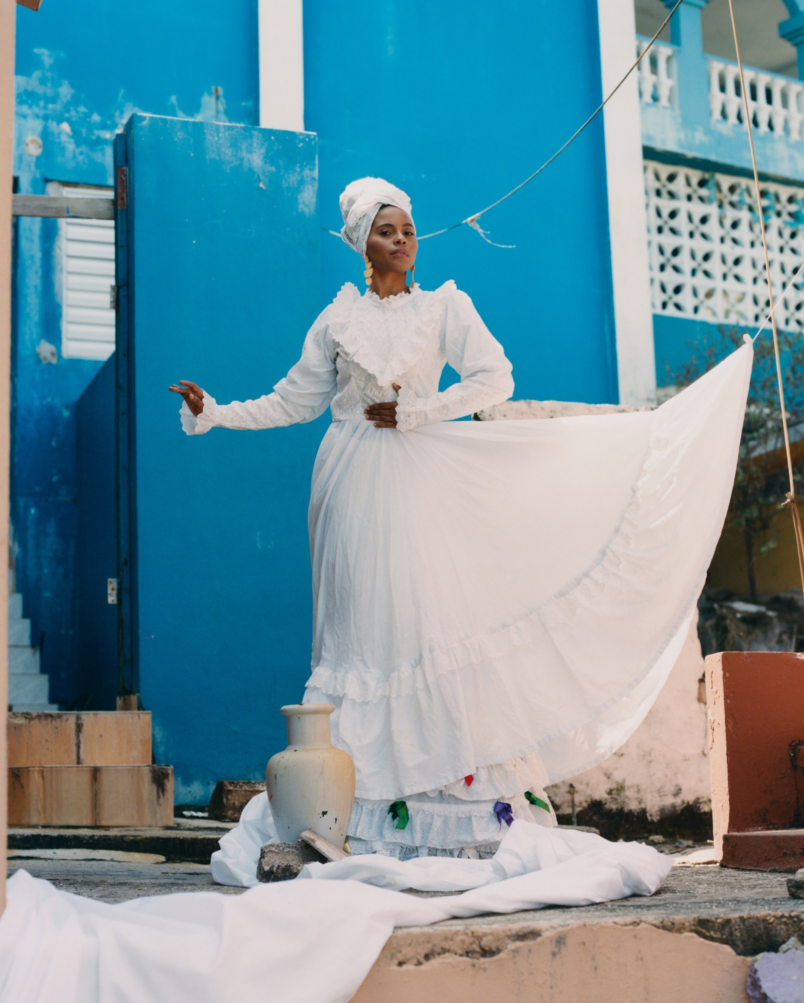 portait of a woman in white for Camila Falquez: Gods That Walk Amongst Us