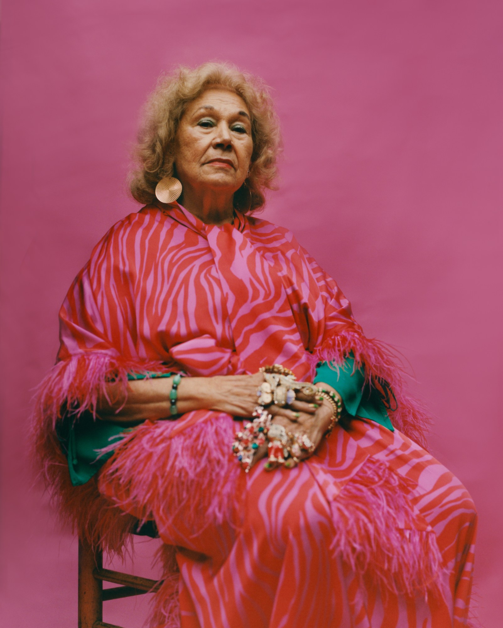 portrait of a woman in front of a pink background for Camila Falquez: Gods That Walk Amongst Us