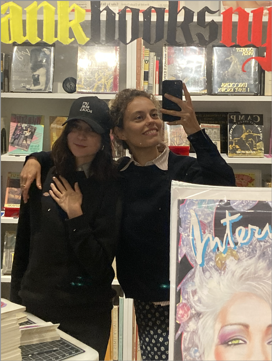 gemma janes taking a mirror selfie at left bank books in nyc