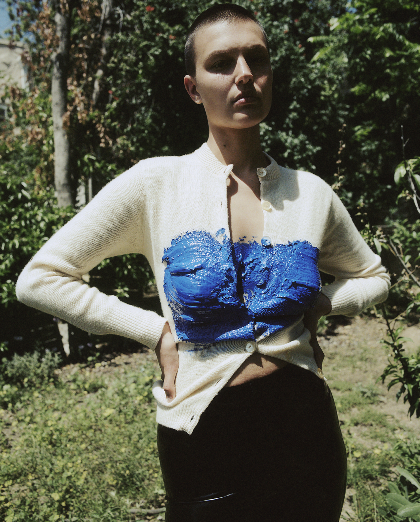 Celina Ralph with blue paint on cardigan in the Zoë Ghertner story in i-D 368 Earthrise Issue