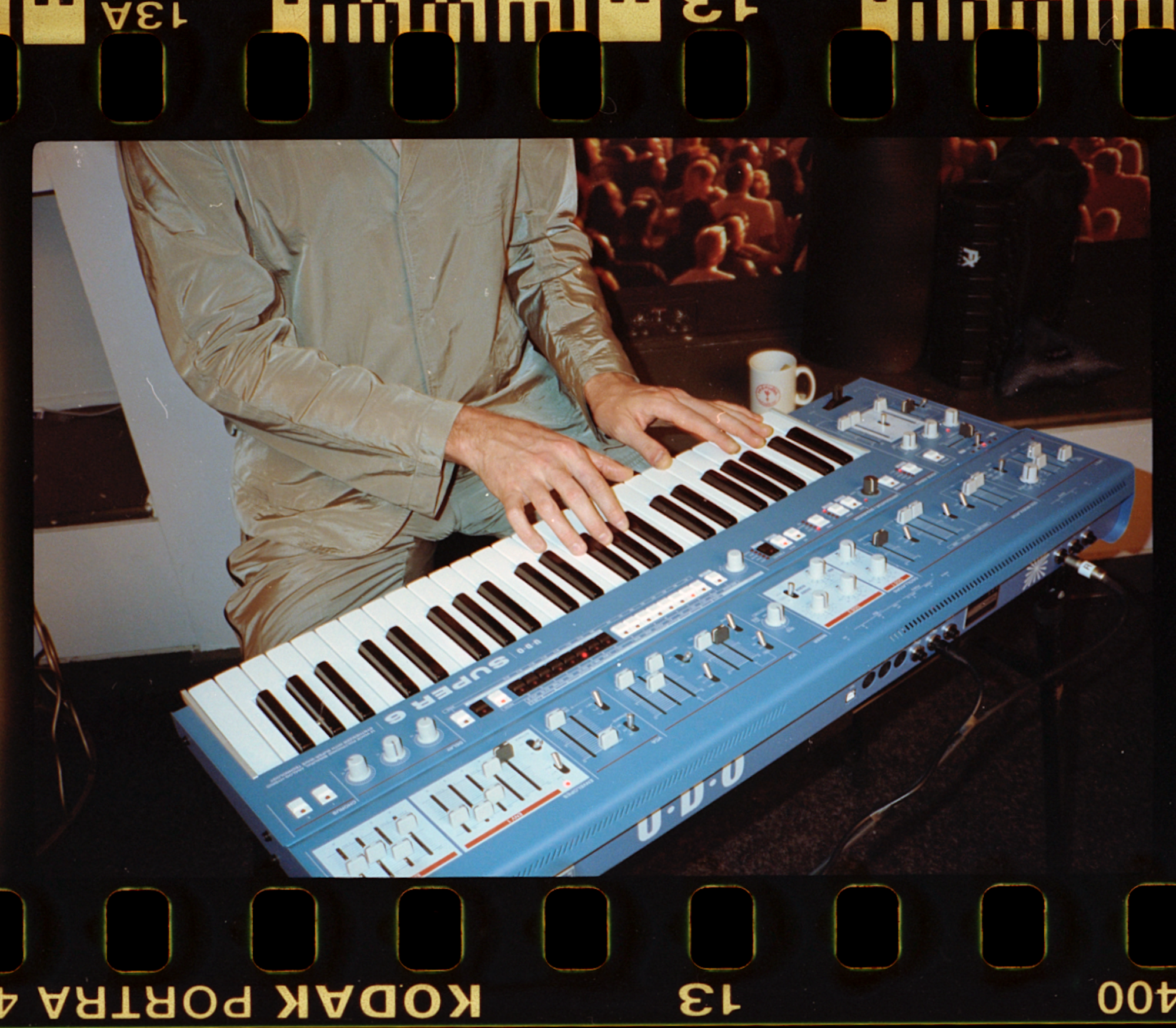 james blake playing keyboard at show