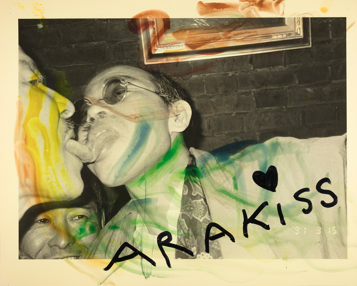 masahisa fukase and araki touch tongues in a polaroid covered in paint and pen