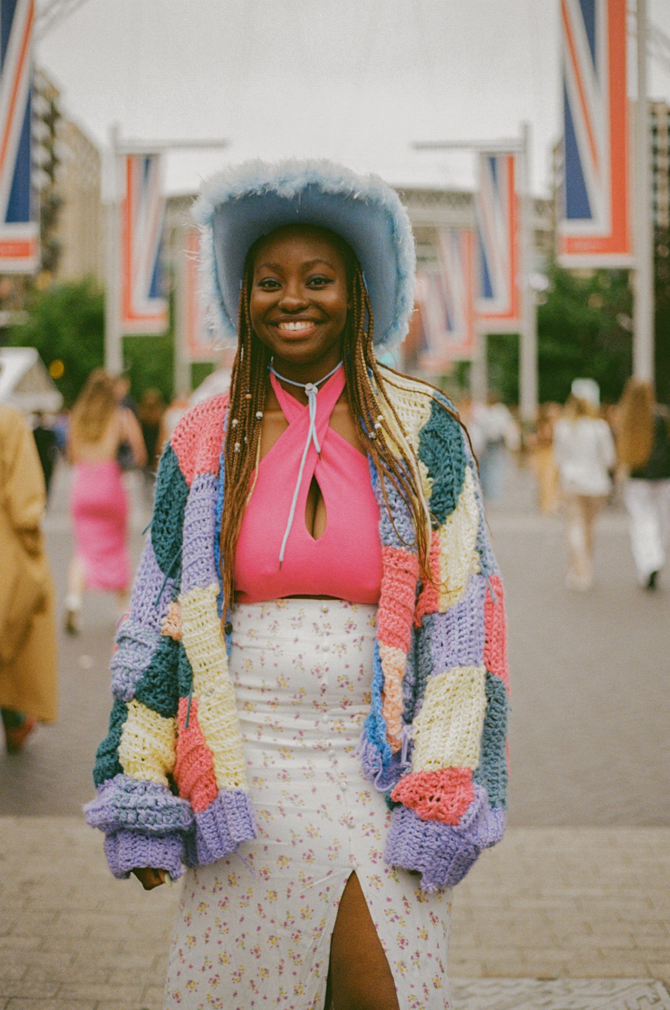 a harry styles fan in a crochet cardigan