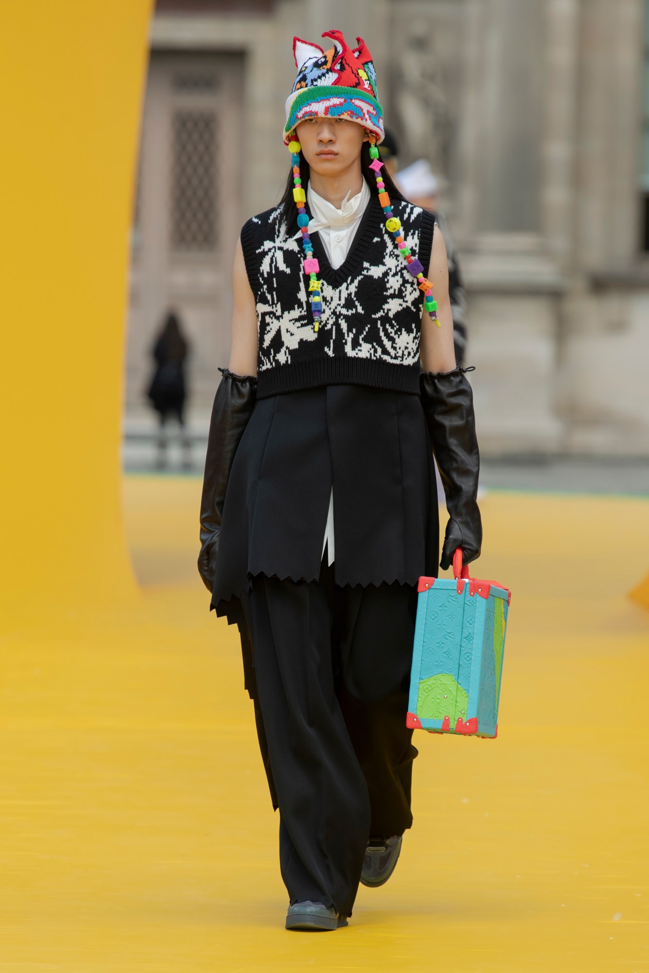 Model walking for Louis Vuitton SS23 menswear show