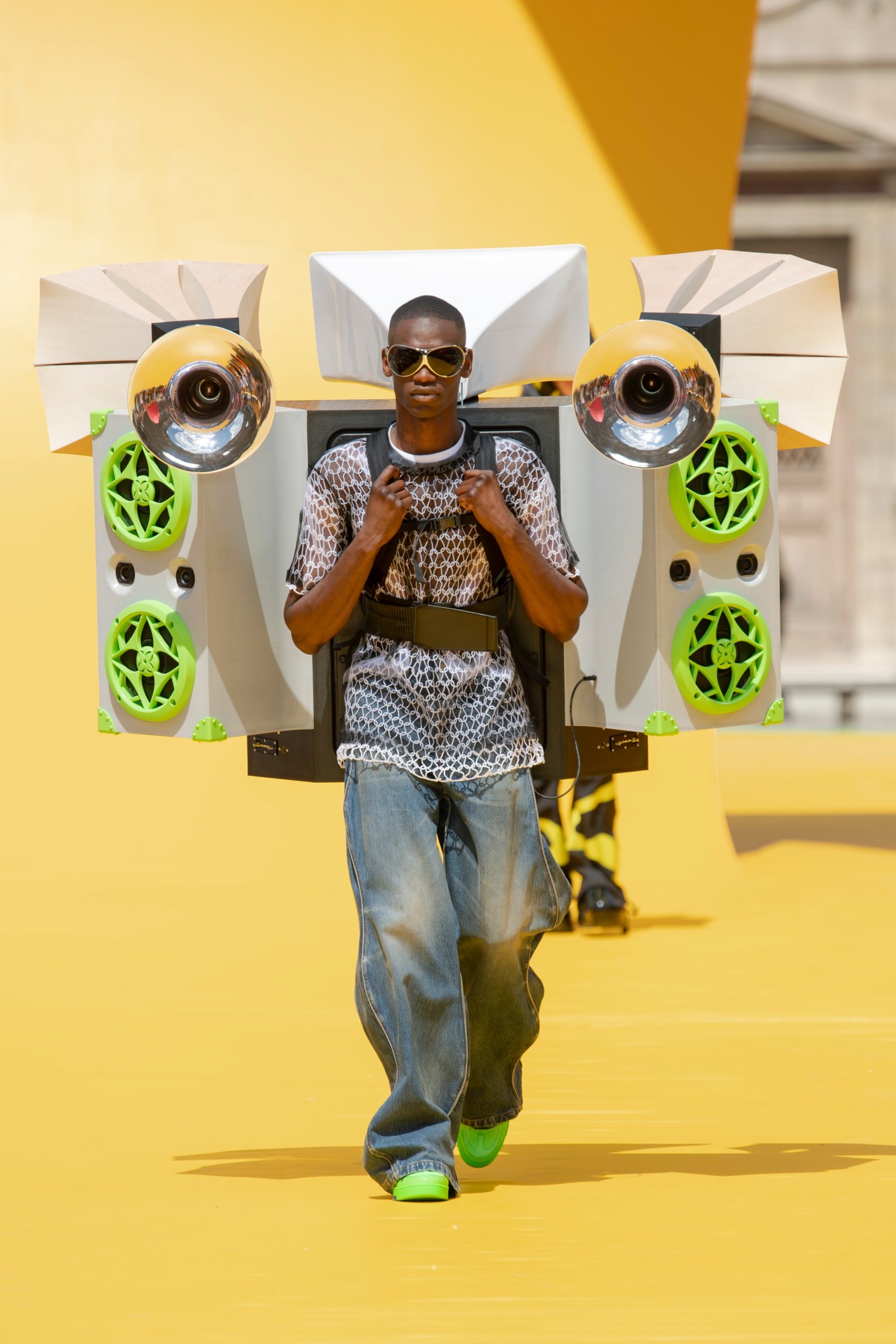 Model walking for Louis Vuitton SS23 menswear show