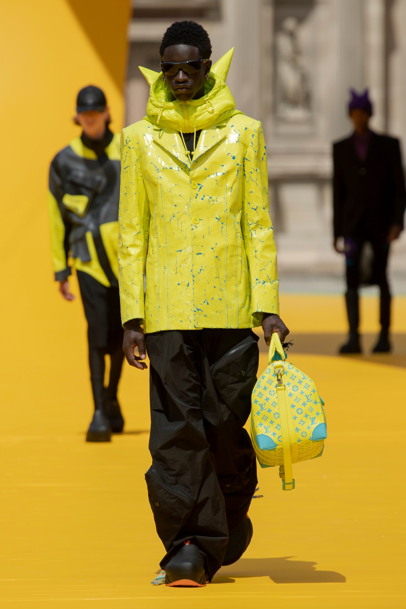 Model walking for Louis Vuitton SS23 menswear show