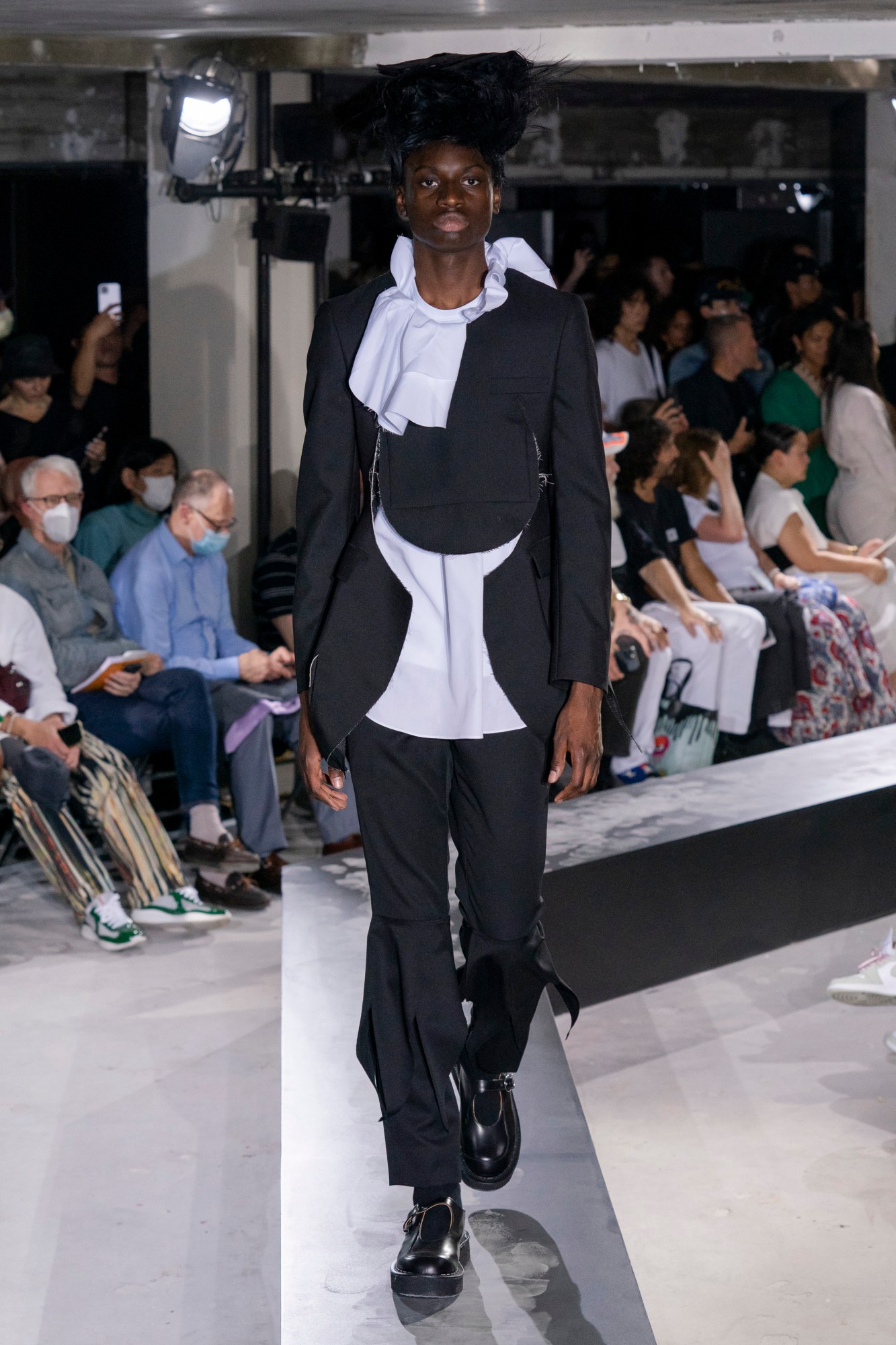 Model walking for Comme Des Garcons Homme Plus SS23 Menswear Show