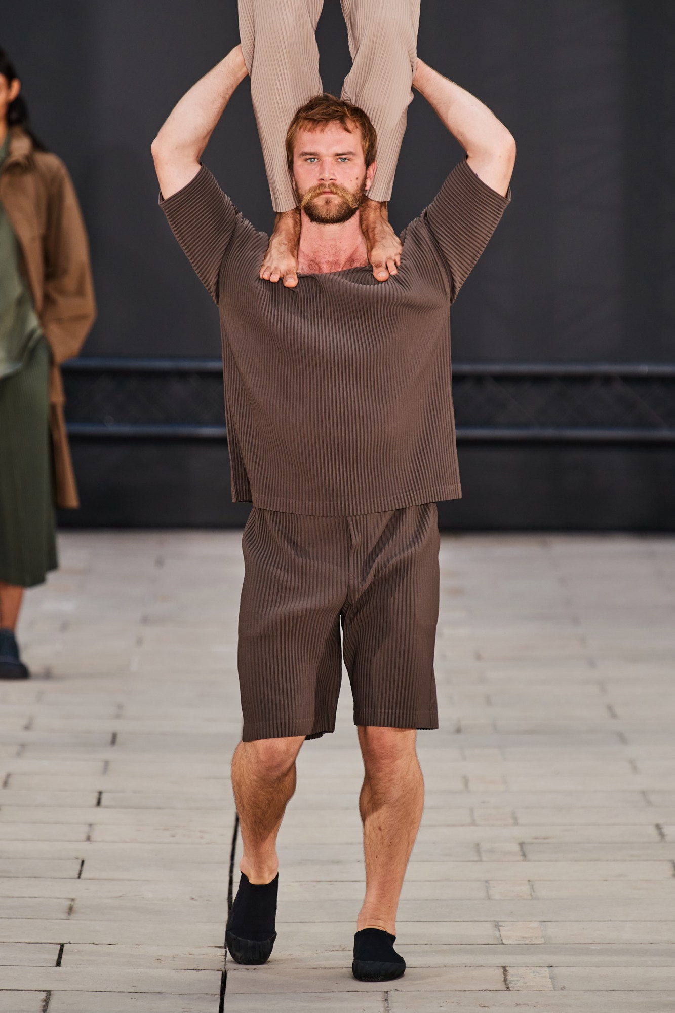 model walking for Homme Plissé Issey Miyake SS23 Men's show