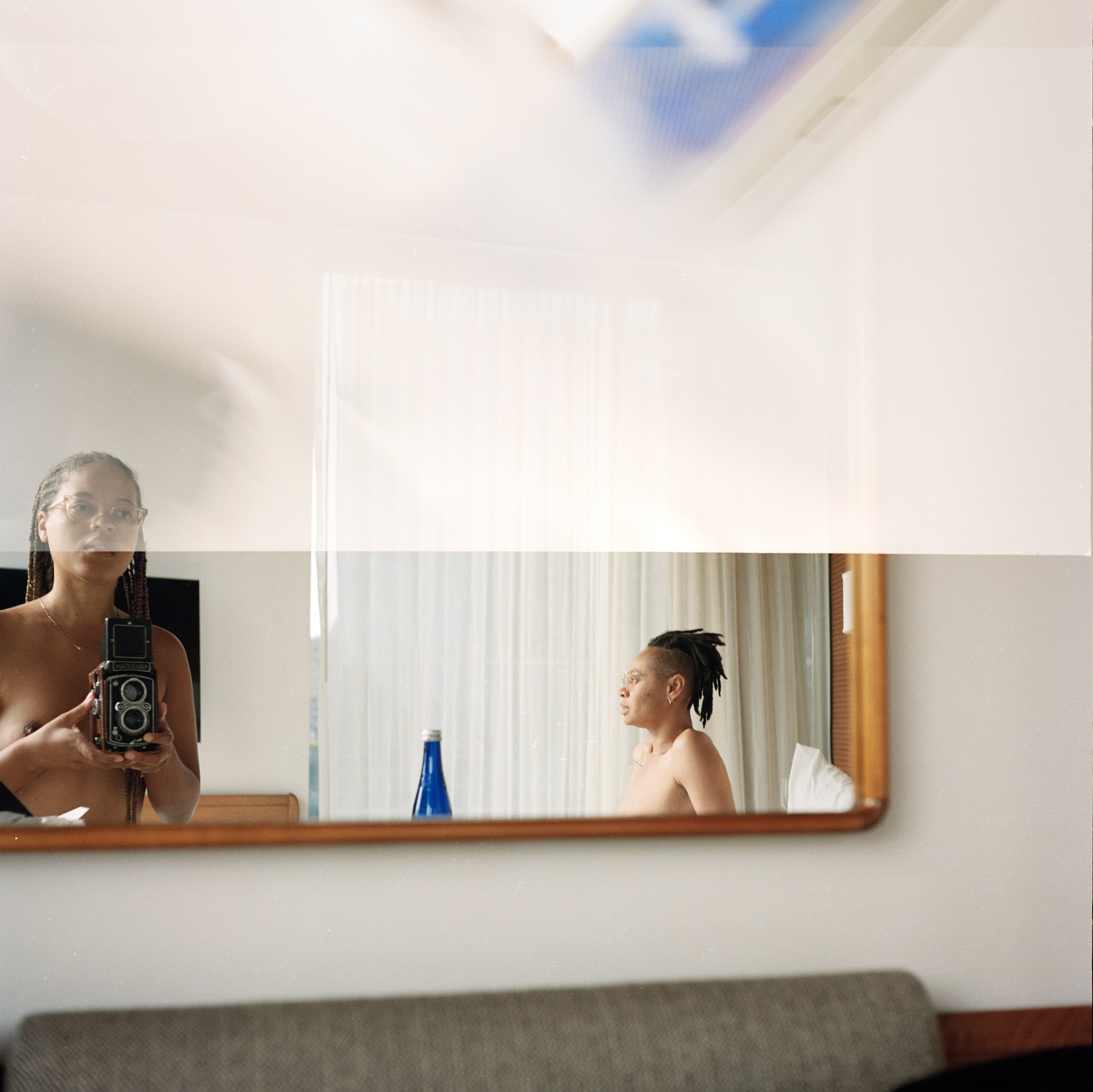 naima green naked and taking a self portrait in the mirror with her partner