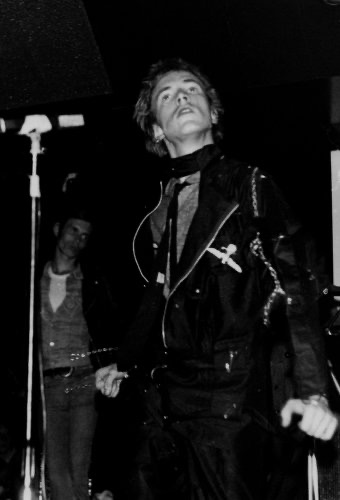 Iggy Pop on stage.