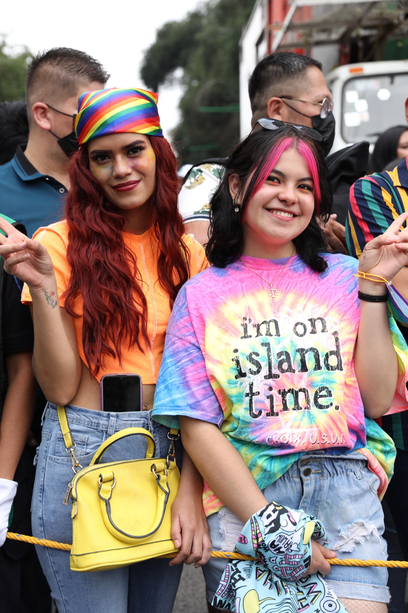 two people showing peace signs at Mexico Pride 2022