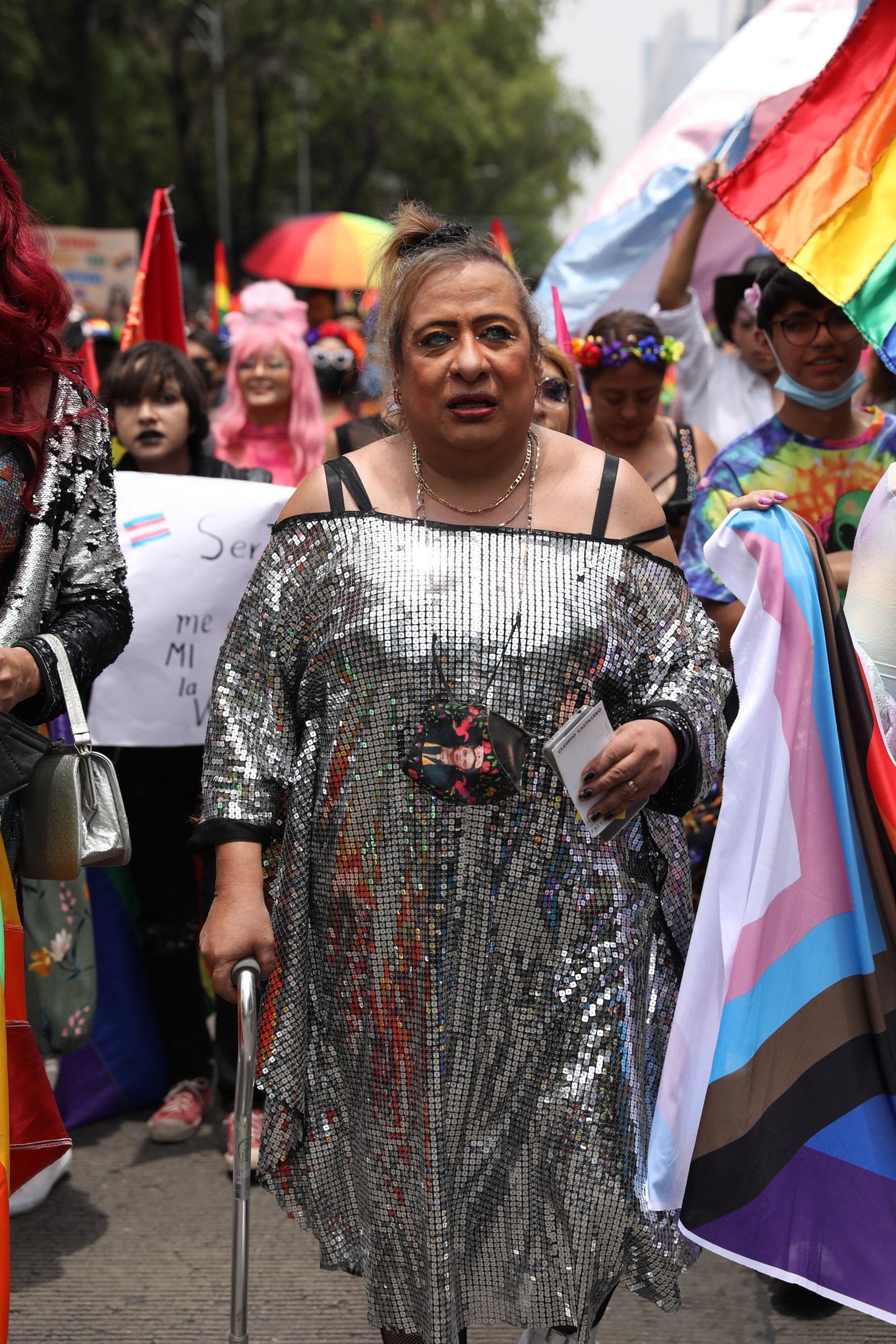 person in a silver dress at Mexico Pride 2022