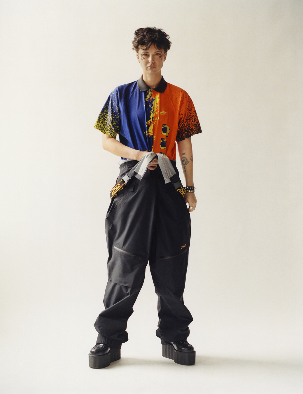 model wearing a polo and tracksuit bottoms in i-D 369 the Earthrise issue