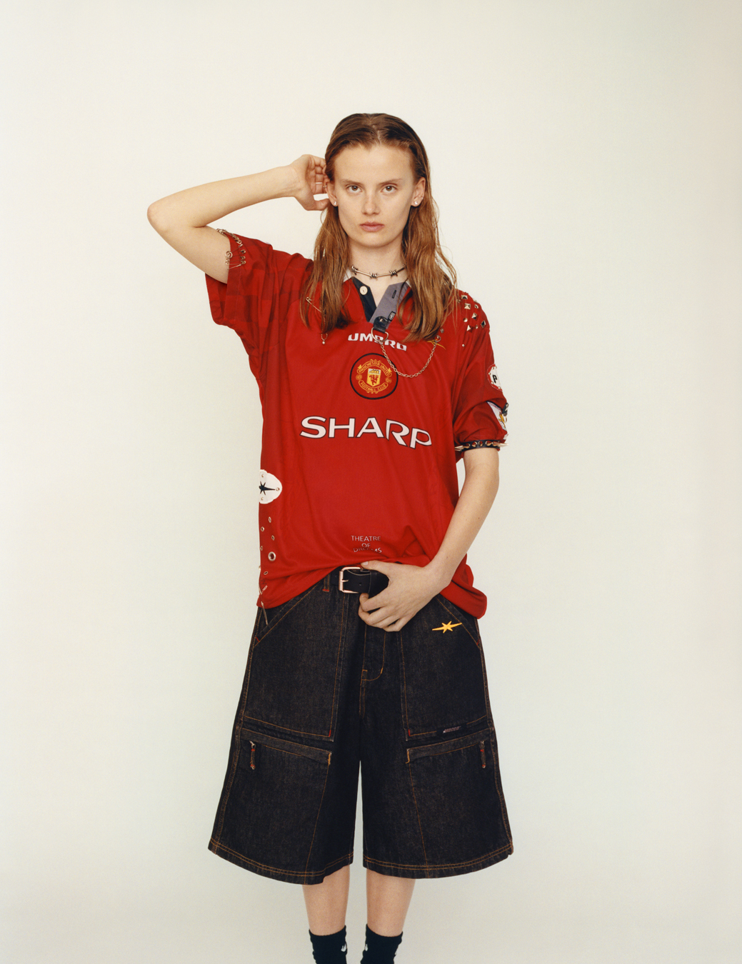 model wearing a football top and shorts in i-D 369 the Earthrise issue