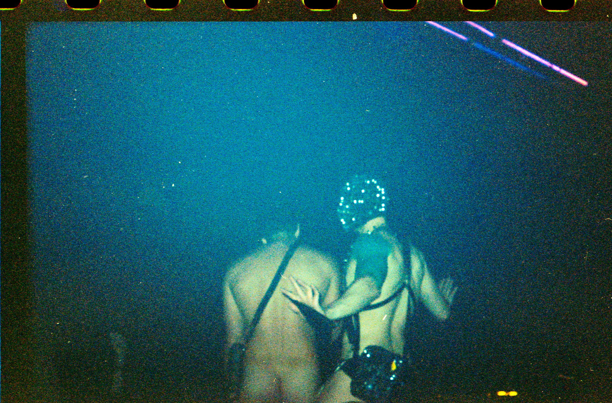 two naked performers at a rave in brazil