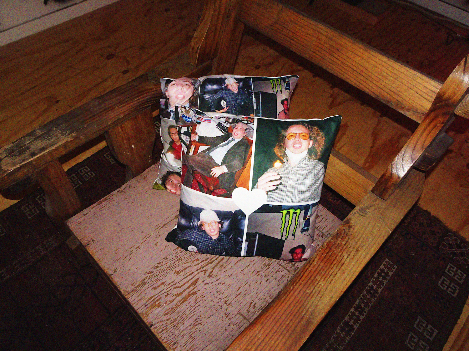 pillows collaged with photos sitting on a wooden chair