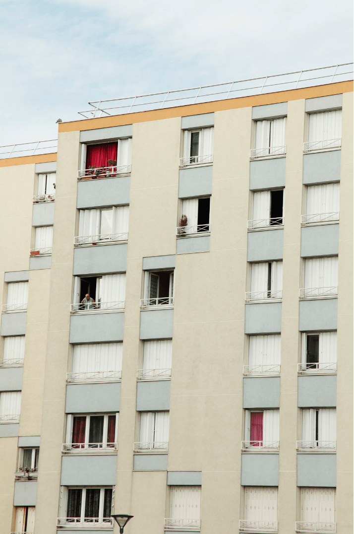 image of a paris towerblock against grey sky