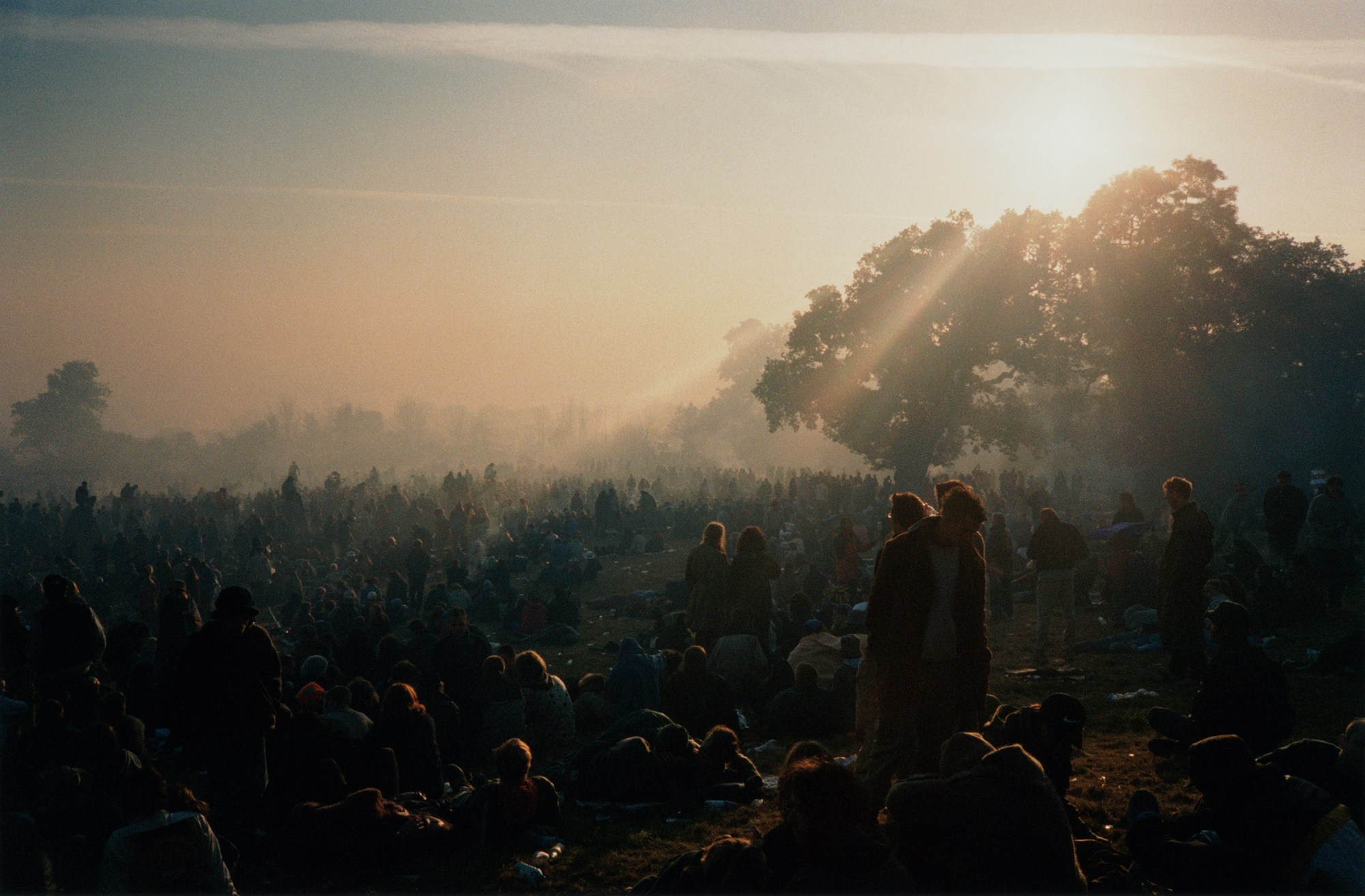 Photo of the crowd at Glastonbury at sunrise