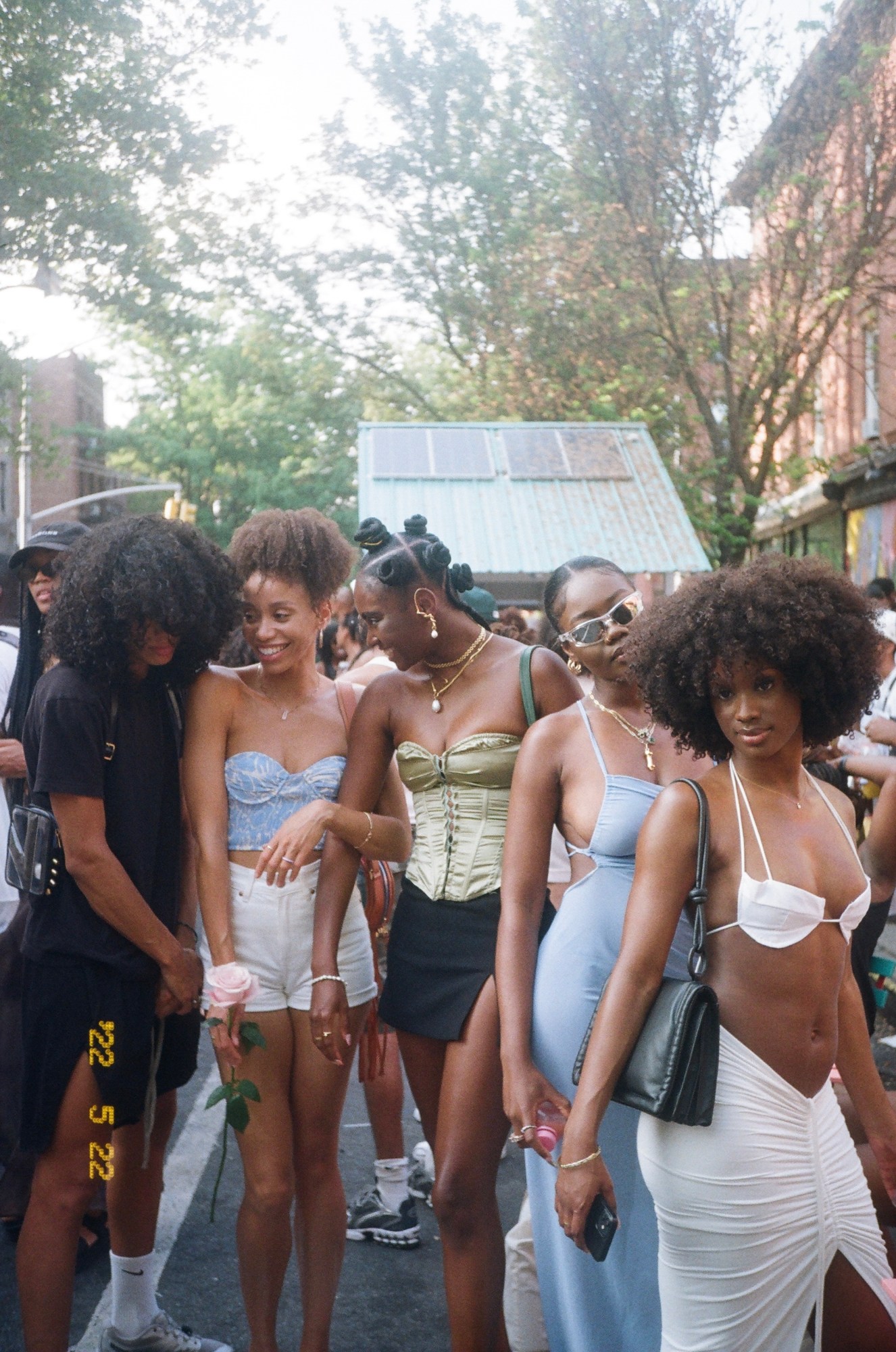 women dressed up at a street party