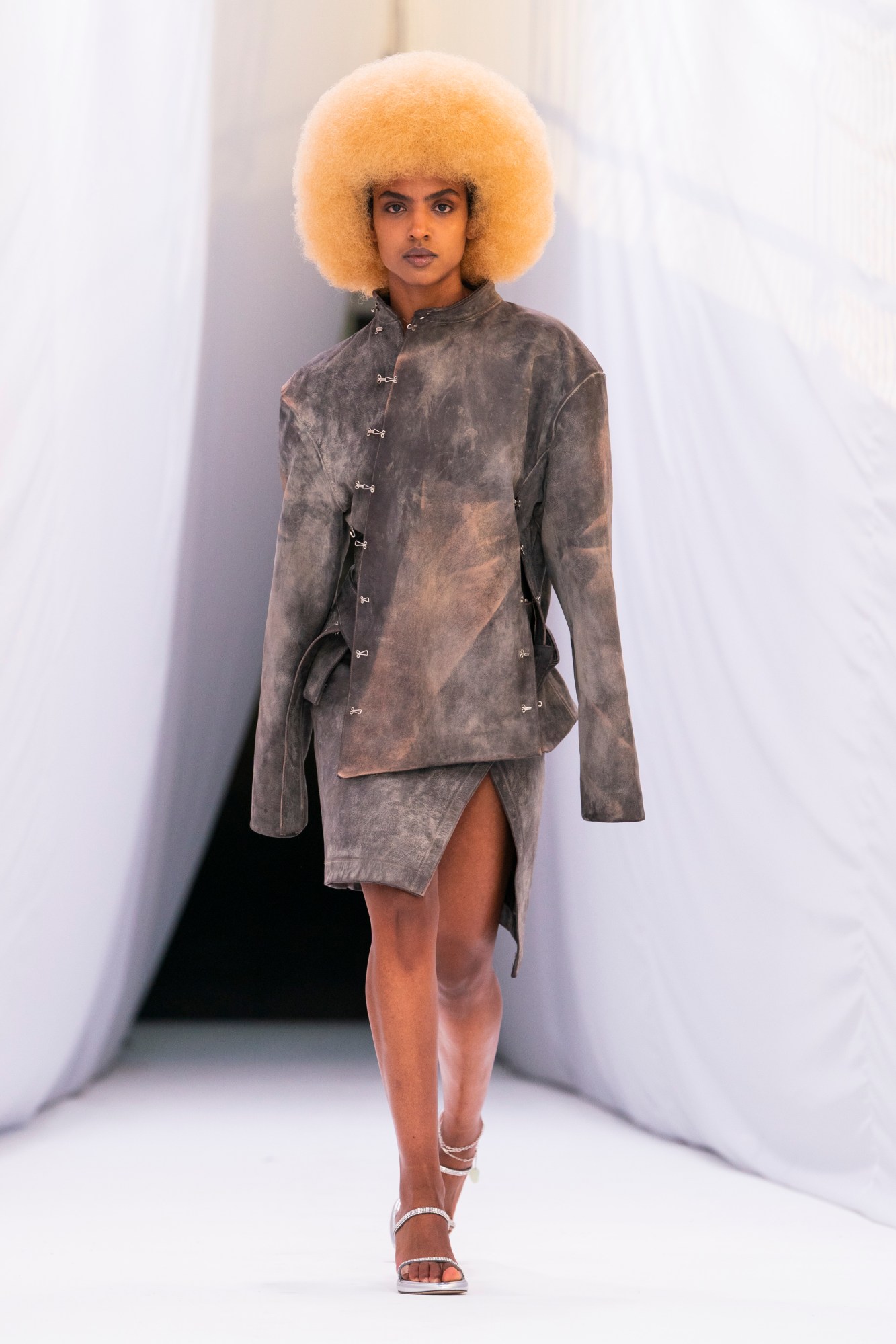 A model walking Jade Cropper SS23