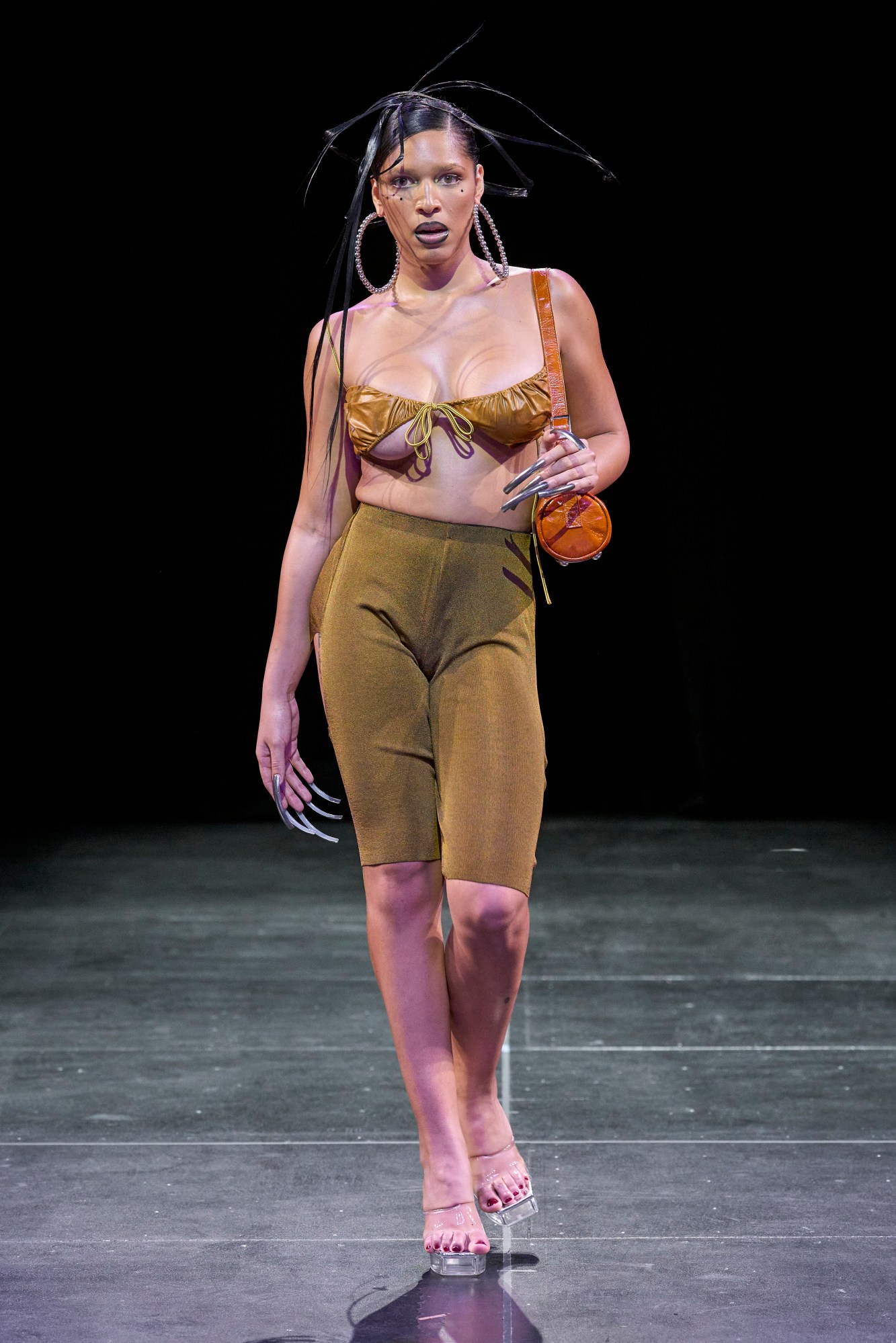 A model walking the runway at No Sesso SS23 show.