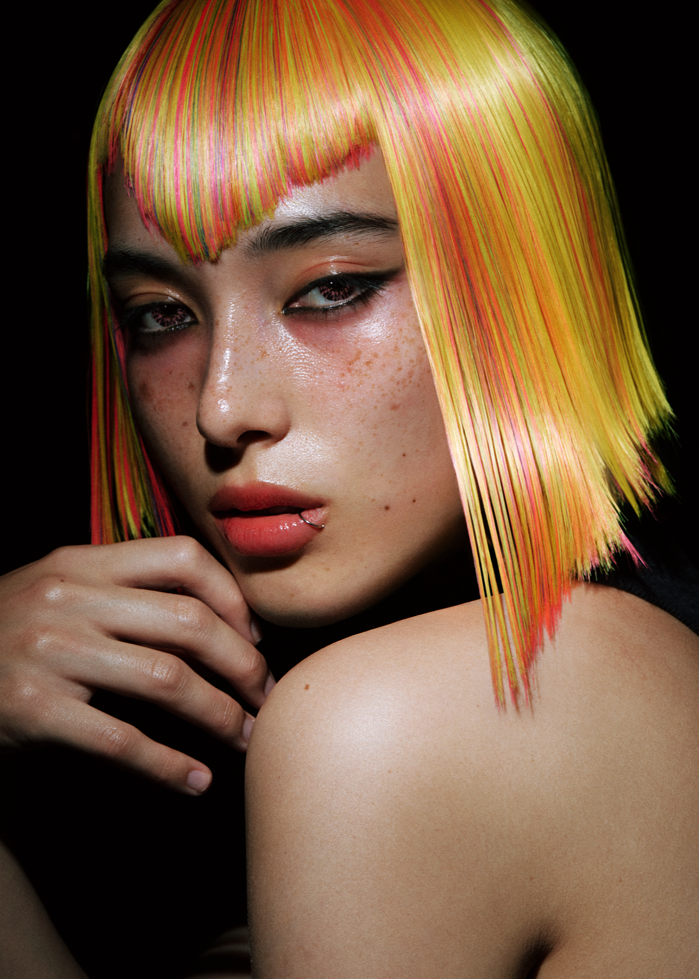 megumu wearing a rainbow wig with an abstract fringe