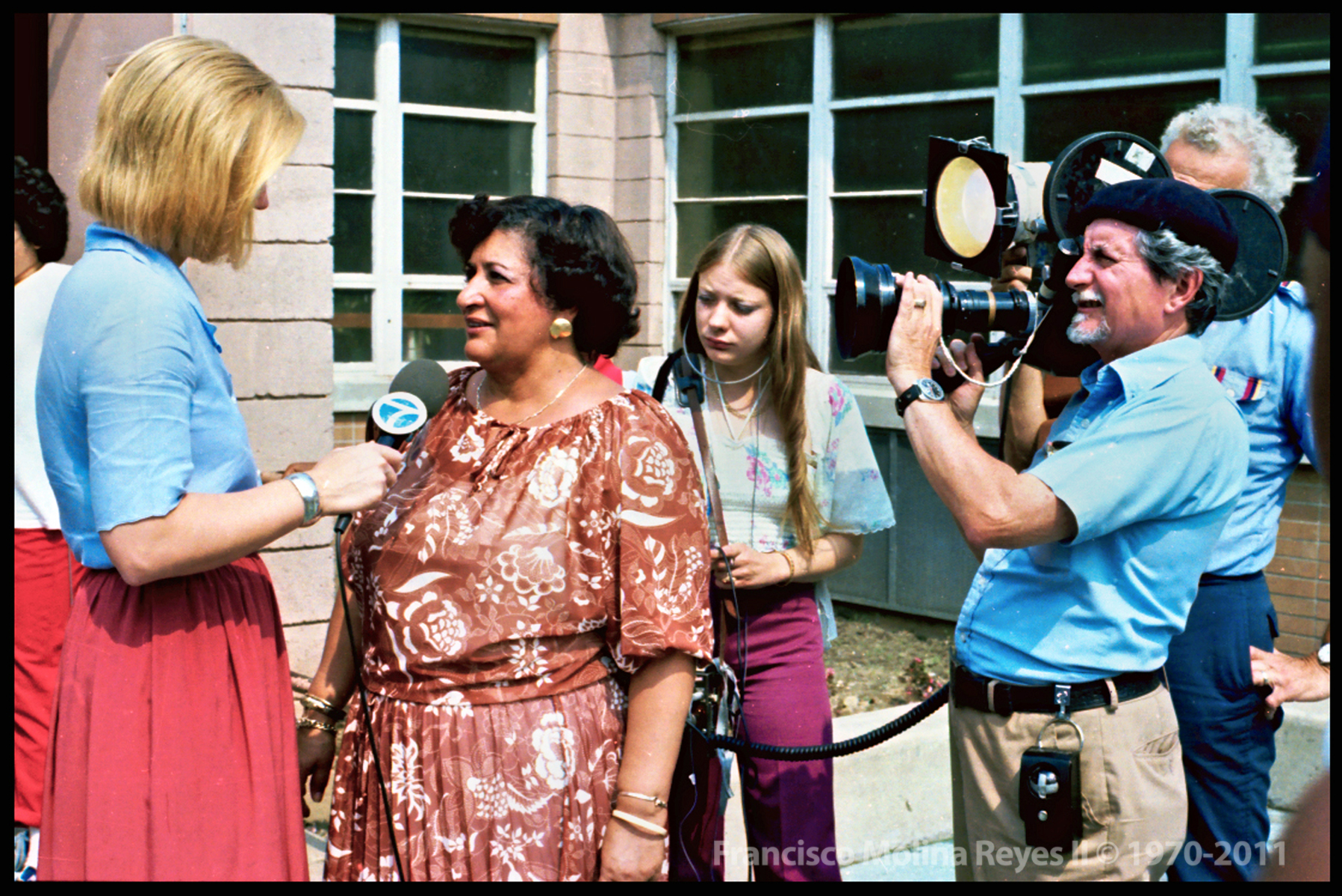 Photo of Dr. Evelina López Antonetty being interviewed for Channel 7 News