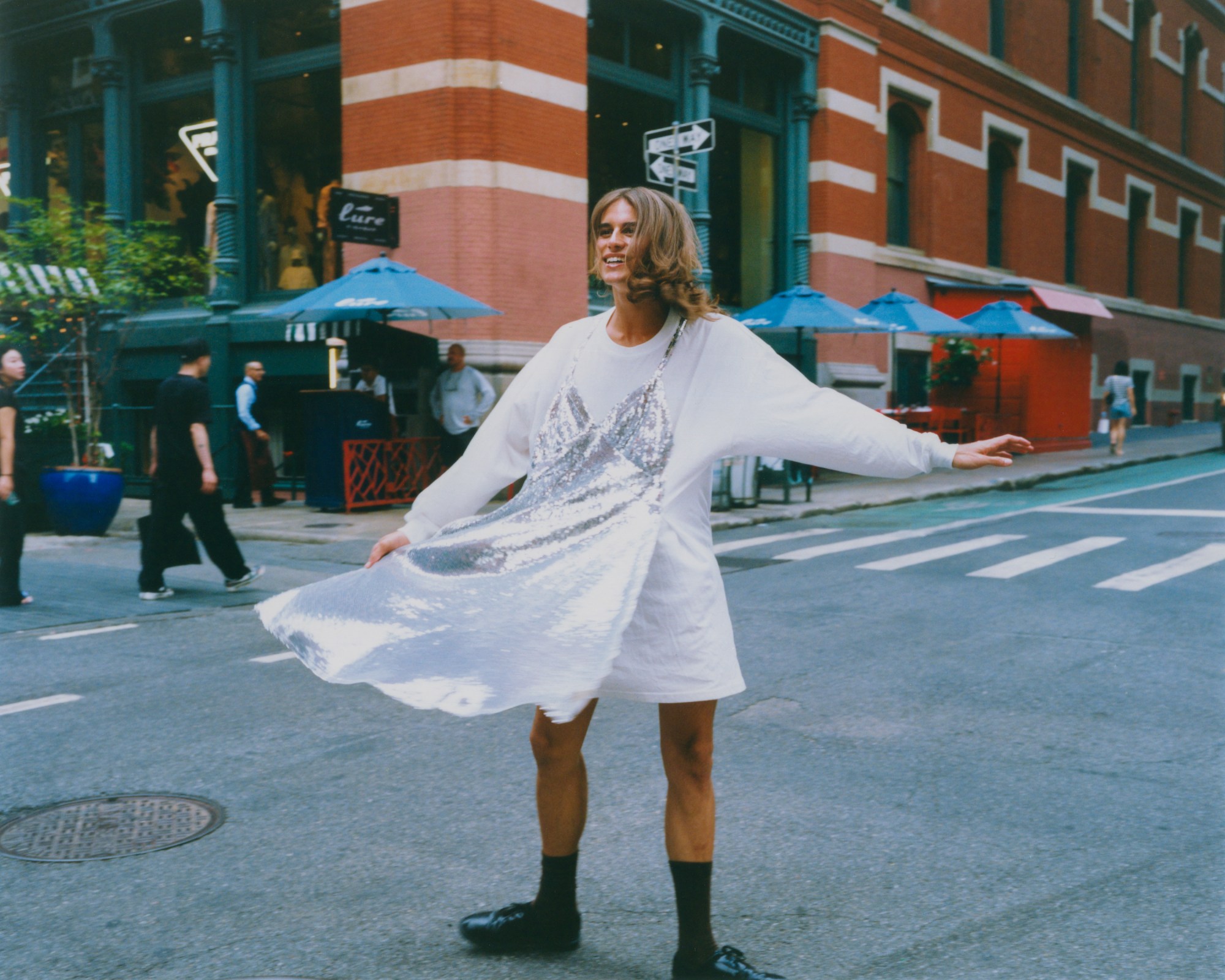 fernando casablancas twirling in a sequin tshirt dress in new york city