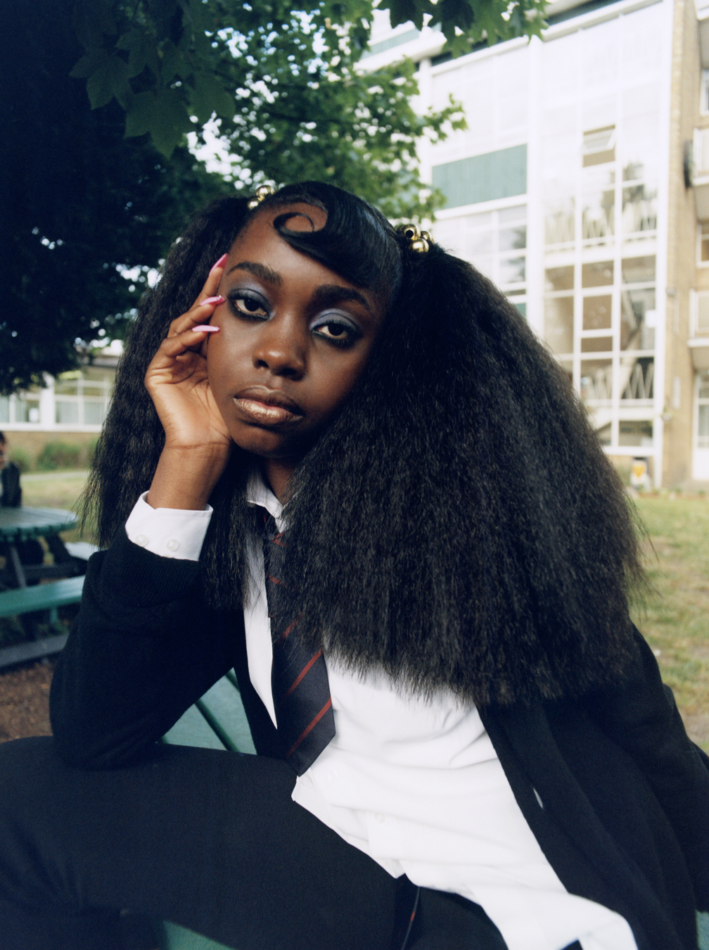 School kid in uniform photographed by Bolade Banjo in i-D's The Ultra! Issue, no.369, Fall 2022